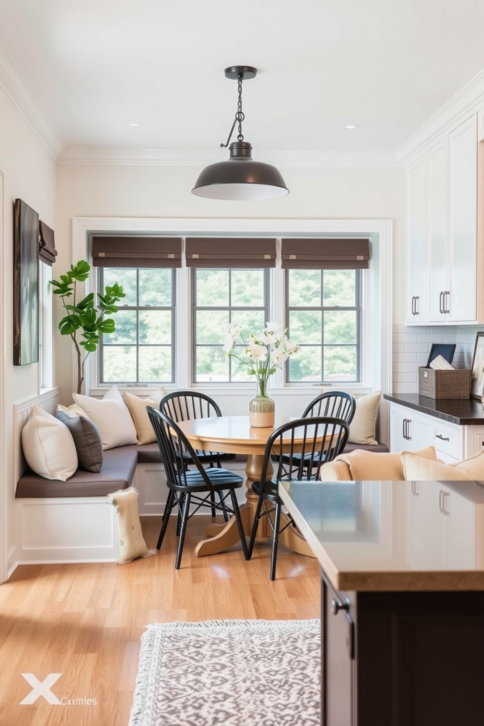 Cozy nook with built-in bench seating. The nook features plush cushions in soft fabrics and a round wooden table surrounded by stylish chairs. Small kitchen dining room design ideas. The space is bright and airy with light cabinetry and a farmhouse-style table that invites casual gatherings.