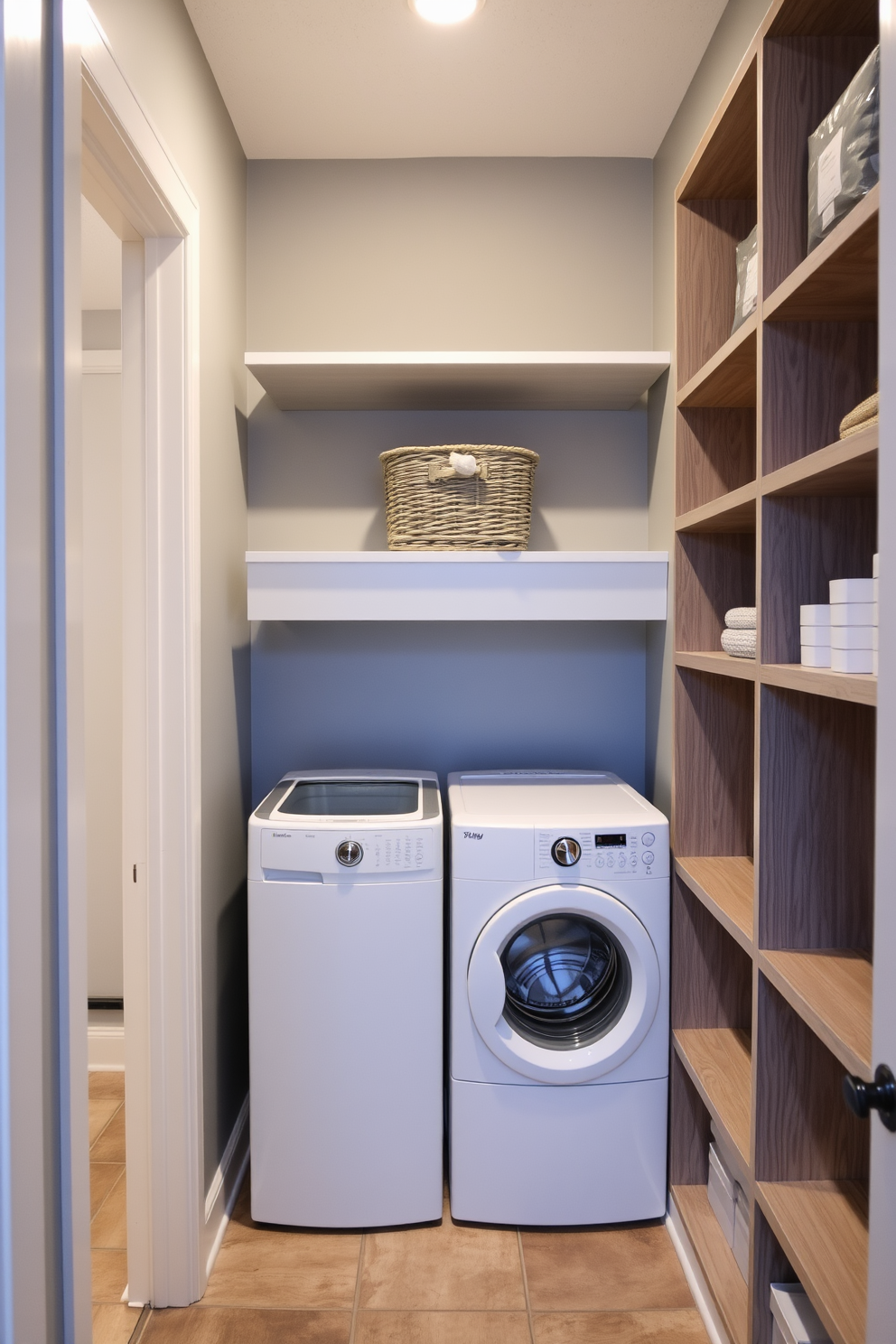 A cozy laundry closet tucked in a hallway. It features a stackable washer and dryer with a sleek white finish, flanked by open shelving for storage and organization. The walls are painted in a soft gray tone, creating a calm atmosphere. A small folding counter is integrated above the machines, adorned with a decorative basket for laundry essentials.