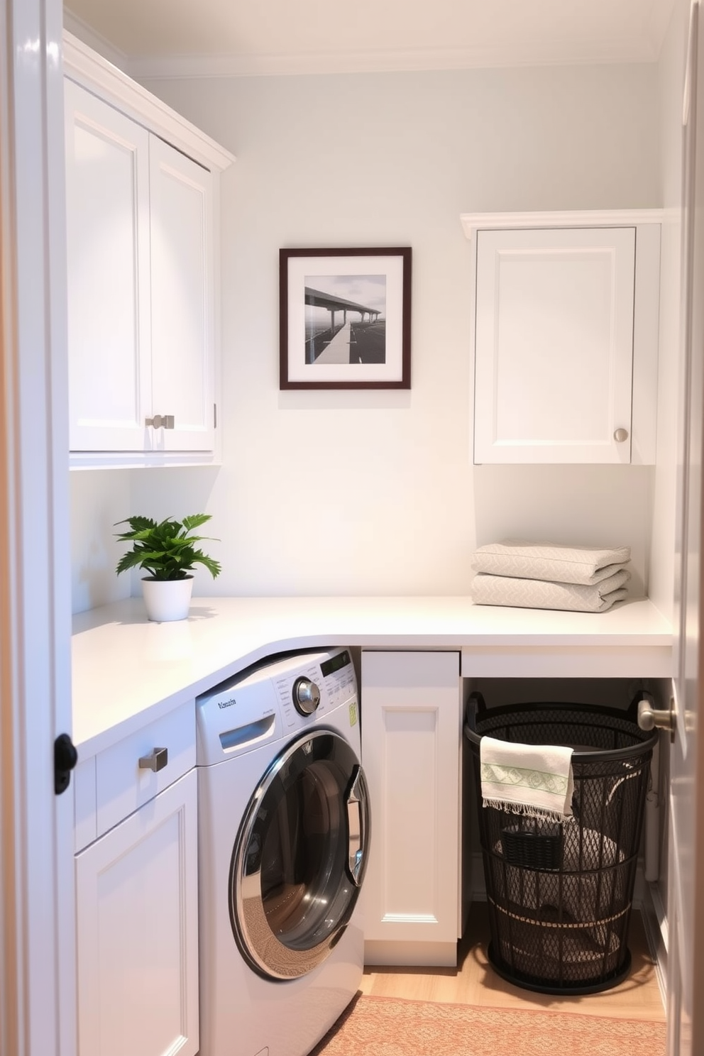 A cozy small laundry room with bright white cabinetry and a sleek countertop for folding clothes. A small potted plant sits on the countertop, adding a touch of freshness and greenery to the space. The walls are painted in a soft pastel color, creating a light and airy feel. A stylish laundry basket is placed in the corner, and a framed picture hangs above to personalize the room.