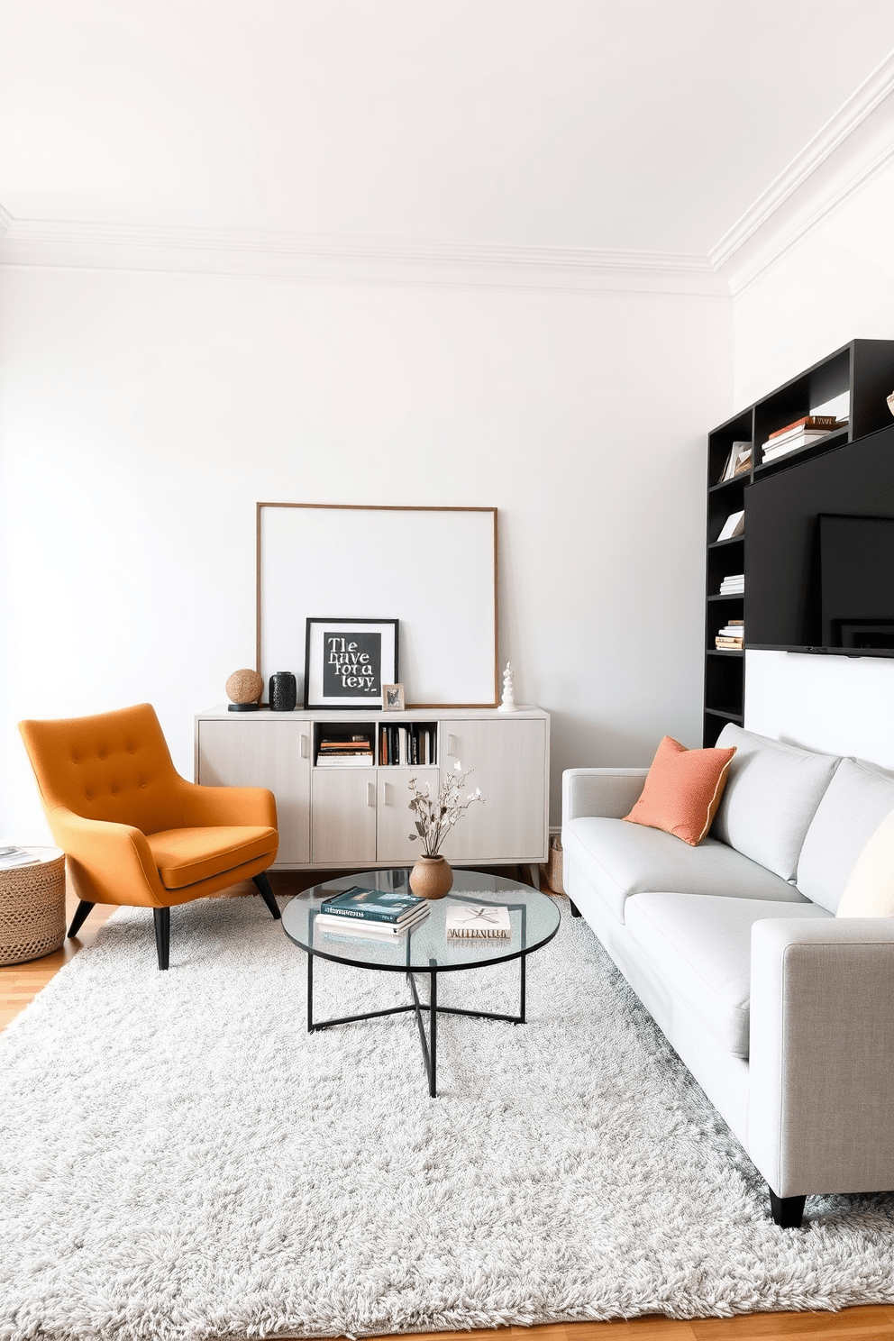 A cozy small living room features a light gray sectional sofa positioned against a wall, complemented by a round glass coffee table in the center. A minimalist bookshelf with open shelving holds a few carefully curated books and decorative items, enhancing the sense of space. The walls are painted in a soft white to reflect light, while a large mirror hangs above the sofa, creating an illusion of depth. A single armchair in a bold color adds a pop of interest without overwhelming the room, and a plush area rug defines the seating area.