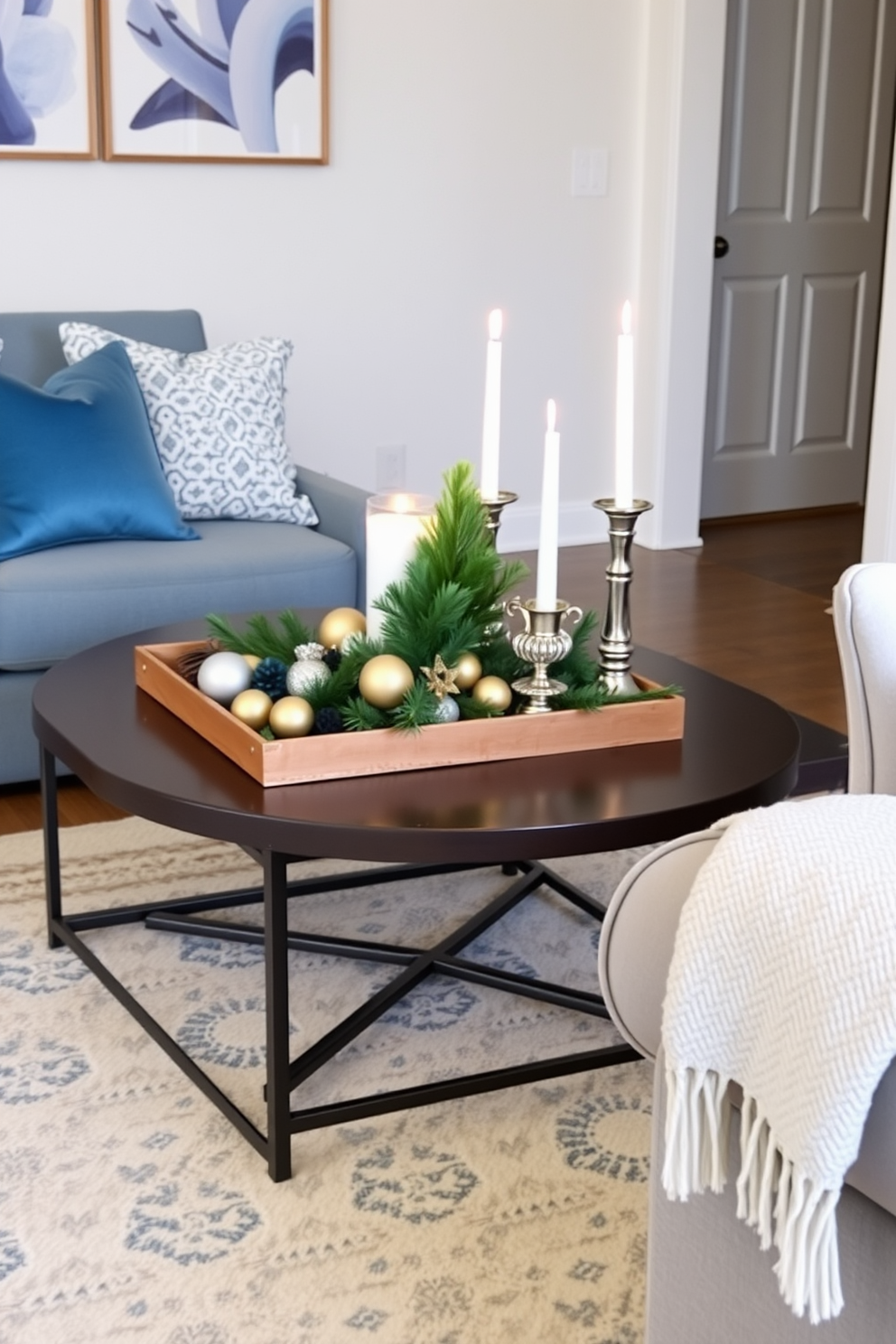 A stylish coffee table adorned with seasonal decor creates a warm and inviting atmosphere. The tabletop features a beautiful arrangement of candles, festive ornaments, and a small evergreen centerpiece. In a small living room, the coffee table serves as a focal point for Hanukkah decorating ideas. Soft blue and silver accents complement the decor, while a cozy throw blanket drapes over the armrest of the nearby sofa.