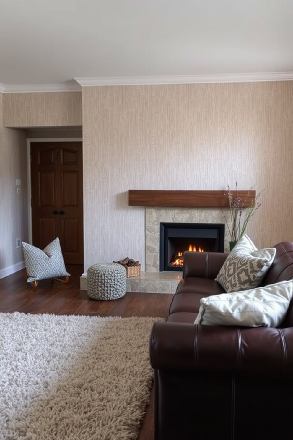 A cozy small living room features a warm fireplace as the focal point. The walls are adorned with a soft textured wallpaper, while a plush area rug anchors the seating area. A combination of leather and fabric upholstery creates an inviting atmosphere. Accent pillows in various patterns and textures add visual interest to the neutral-toned sofa.