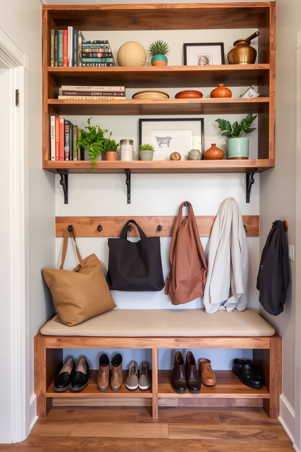 Open shelving displays an array of decorative items including books, plants, and artisanal pieces. The shelves are made of reclaimed wood, adding warmth to the space while maintaining an organized look. The small mudroom features a built-in bench with storage underneath for shoes and bags. Hooks line the wall above the bench, providing a practical yet stylish solution for coats and accessories.