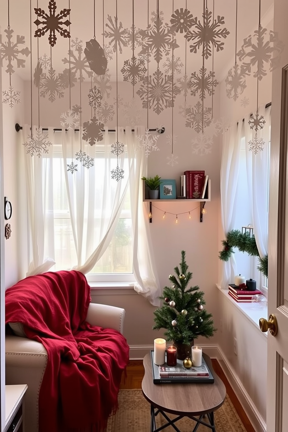 Create a charming small living area adorned with DIY paper snowflakes hanging from the ceiling. The space features a compact sofa draped with a cozy red throw blanket and a small coffee table decorated with festive candles and a miniature Christmas tree. Incorporate a wall-mounted shelf displaying holiday-themed books and ornaments. The windows are dressed with sheer white curtains, allowing natural light to illuminate the delicate snowflakes and create a warm, inviting atmosphere.