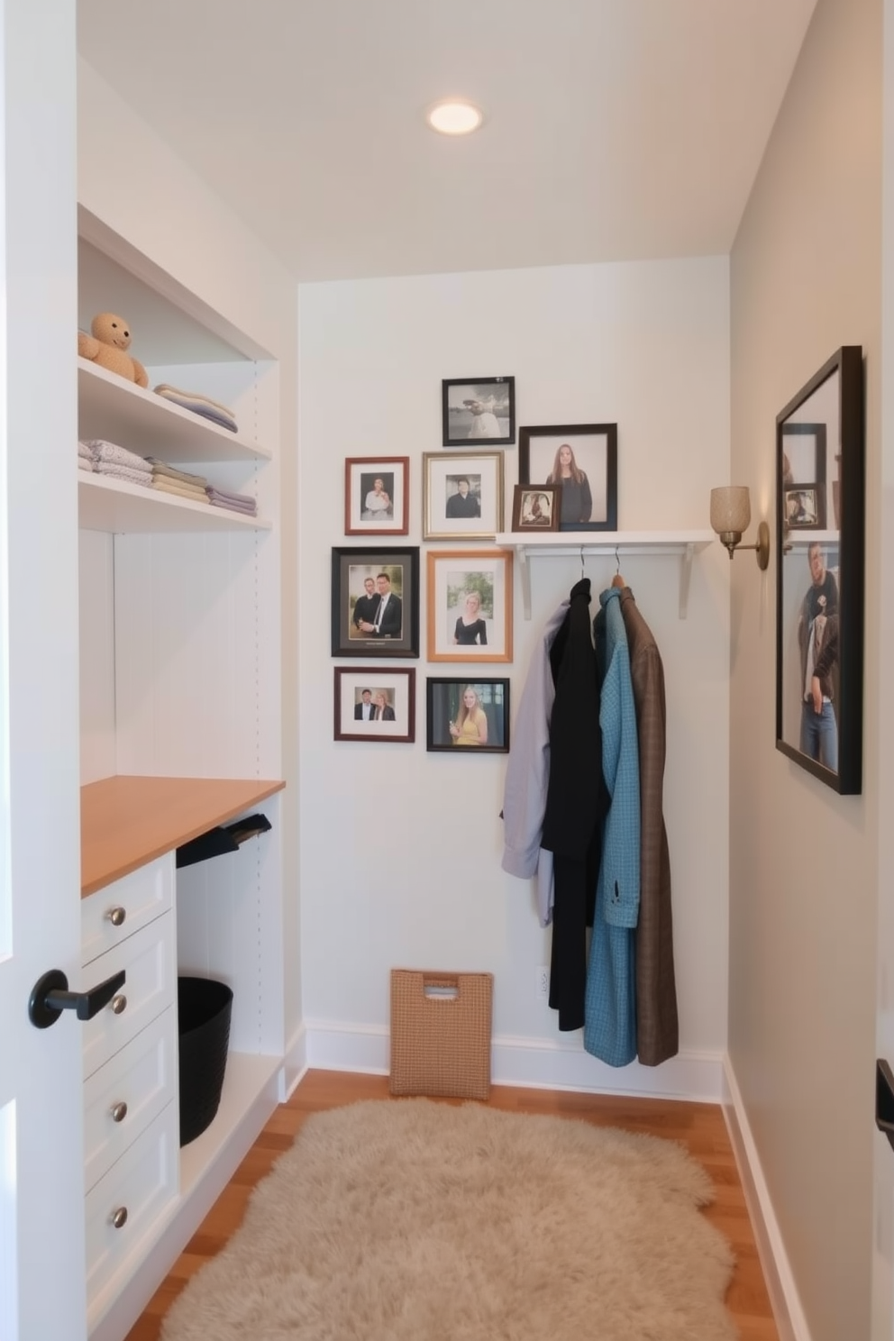 A small walk-in closet with custom shelving and hanging space that maximizes storage. The walls are painted in a soft neutral tone, and a plush area rug adds warmth to the space. A gallery wall featuring a curated selection of framed artwork and personal photographs that reflect individual style. The wall is accented with decorative sconces to enhance the visual appeal and create a cozy atmosphere.