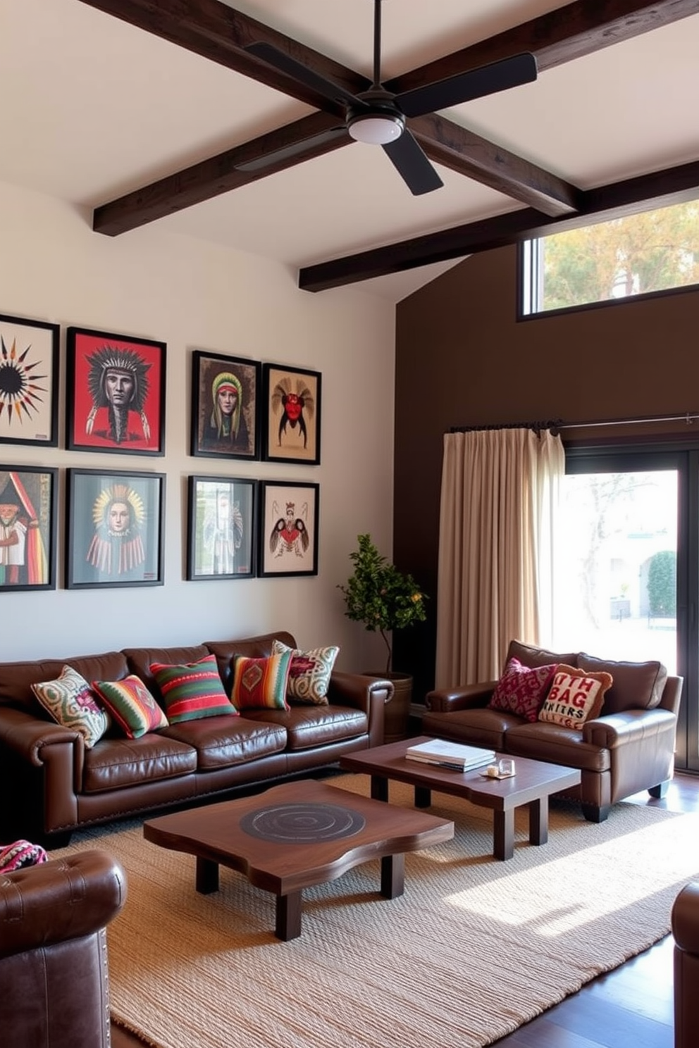 A cozy Southwestern living room that blends modern and traditional elements. The space features a large leather sofa with colorful throw pillows, complemented by a rustic wooden coffee table and woven area rug. On one wall, there is a striking gallery of traditional Native American art framed in contemporary black frames. Large windows allow natural light to flood the room, accented by sheer curtains that soften the sunlight.