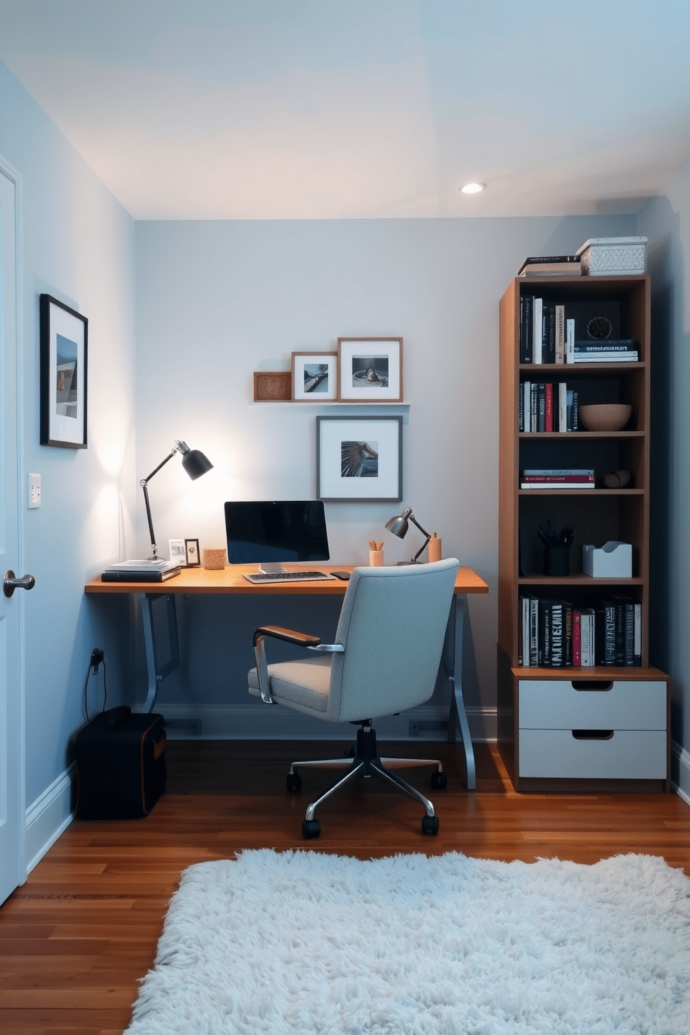 A cozy spare bedroom office features a foldable desk that easily transforms the space for work or relaxation. The room is adorned with soft lighting and a comfortable chair, creating an inviting atmosphere for productivity. The walls are painted in a calming light blue, complemented by a stylish bookshelf filled with books and decorative items. A plush area rug adds warmth to the hardwood floor, making the space feel both functional and welcoming.