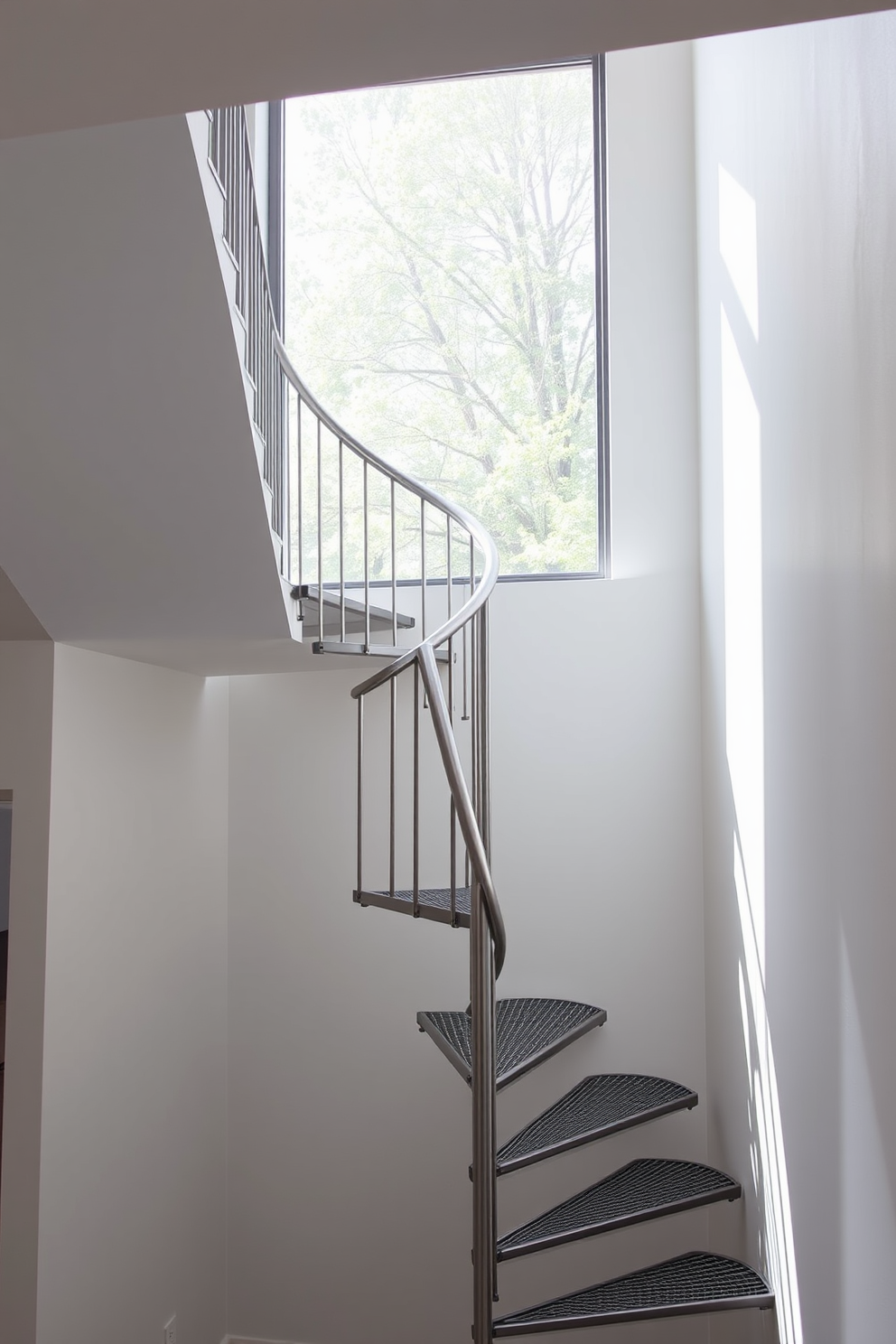 A sleek minimalist metal spiral staircase gracefully ascends to the upper level. The staircase features a simple yet elegant design with thin metal treads and a polished handrail, seamlessly blending into the modern interior. Natural light filters through a large window, casting shadows that enhance the staircase's curves. The surrounding walls are painted in a soft white, creating a clean backdrop that emphasizes the staircase's minimalist aesthetic.