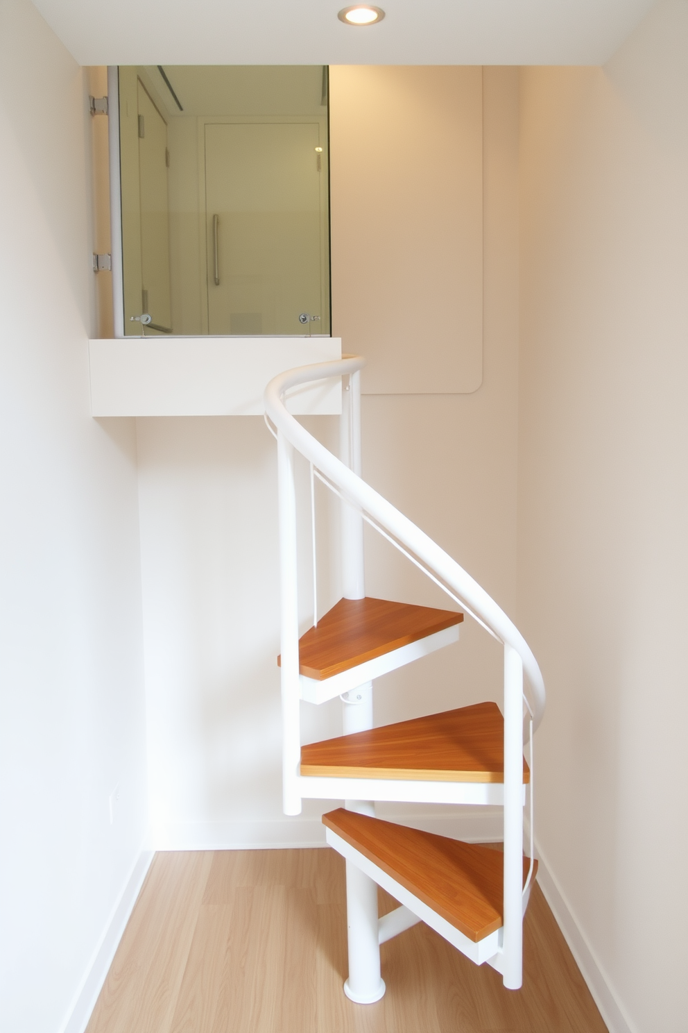 A compact spiral staircase is elegantly designed to fit into a small space, featuring a sleek metal frame and wooden treads that provide warmth and style. The staircase is painted in a soft white finish, allowing it to blend seamlessly with the surrounding walls while maximizing vertical space. The design incorporates a minimalist railing made of tempered glass, enhancing the open feel of the area. Soft, ambient lighting is installed above, highlighting the staircase as a stunning architectural feature.