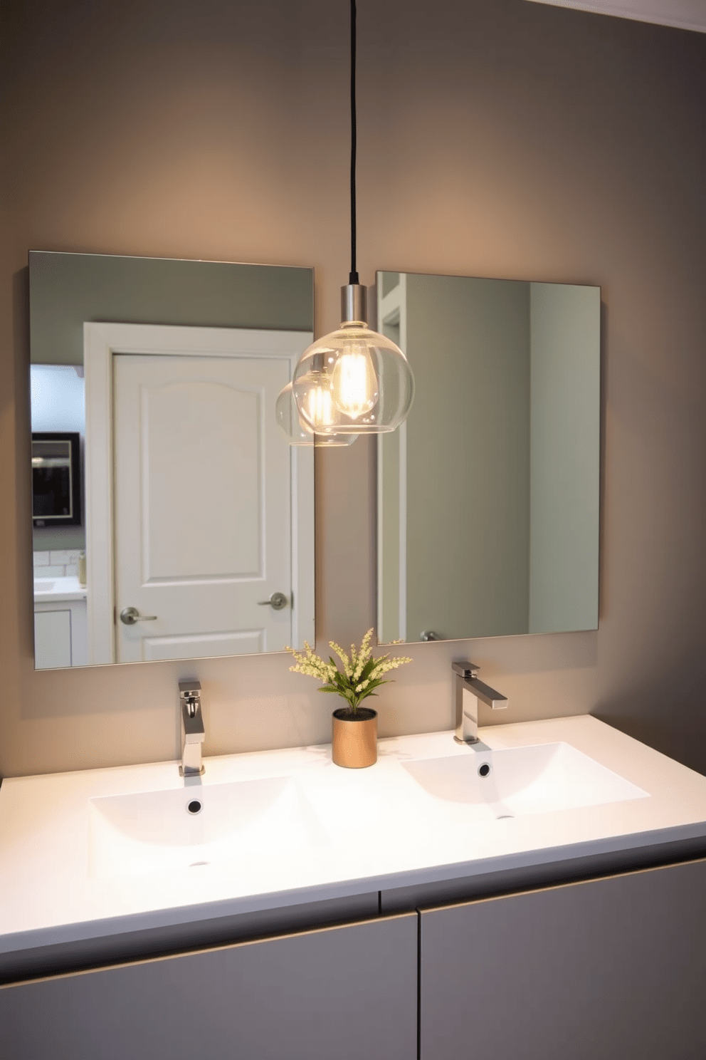 A chic split bathroom design featuring elegant pendant lighting suspended above a sleek vanity. The lighting casts a warm glow, enhancing the ambiance of the space while complementing the modern fixtures and finishes.