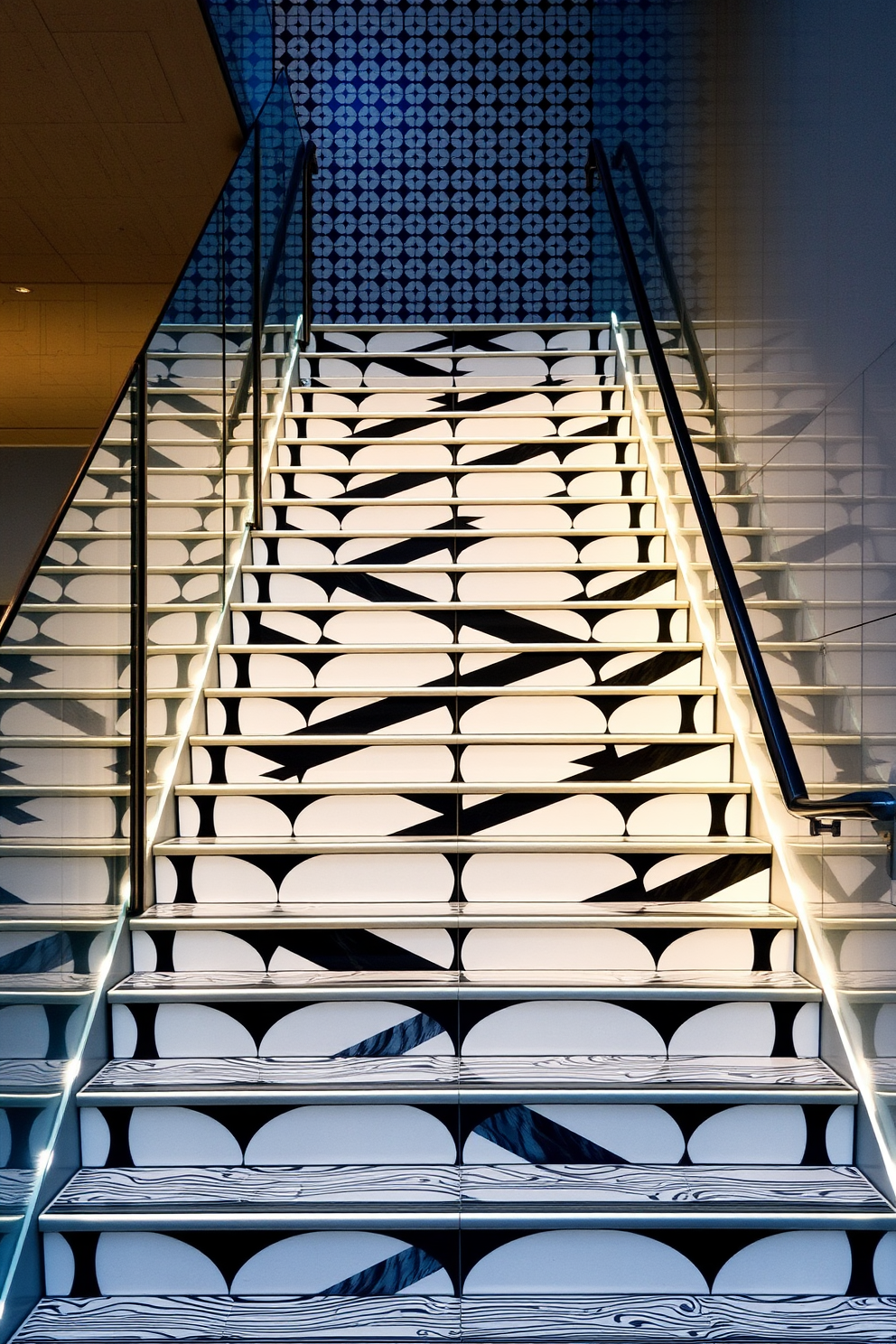 A striking staircase featuring monochrome patterned tiles that create a bold visual statement. The tiles are arranged in a geometric design, with sharp contrasts between black and white elements that draw the eye upward. The staircase is flanked by sleek glass railings that enhance the modern aesthetic. Soft, ambient lighting highlights the intricate tile work, creating a dramatic effect as the light reflects off the surfaces.