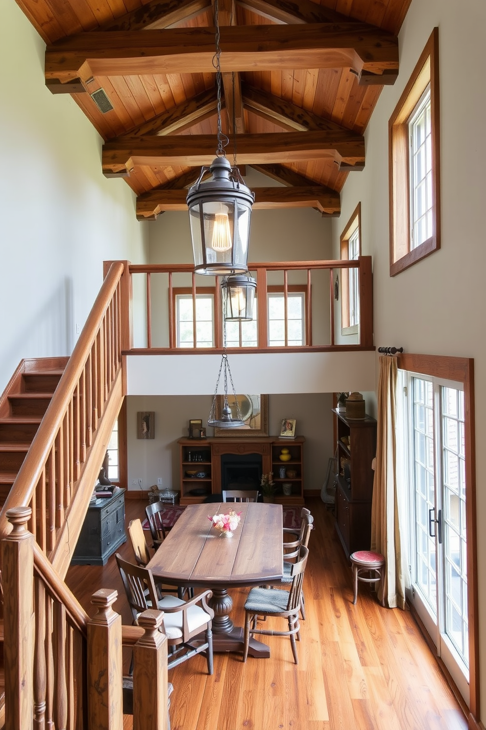 A rustic wooden staircase with exposed beams and warm tones leads to an inviting upper level. Pendant lights with a vintage finish hang gracefully above, illuminating the space with a soft glow. In the dining room, a large wooden table is surrounded by mismatched chairs, creating a cozy, eclectic atmosphere. Large windows allow natural light to flood the room, highlighting the rich textures and earthy colors of the decor.