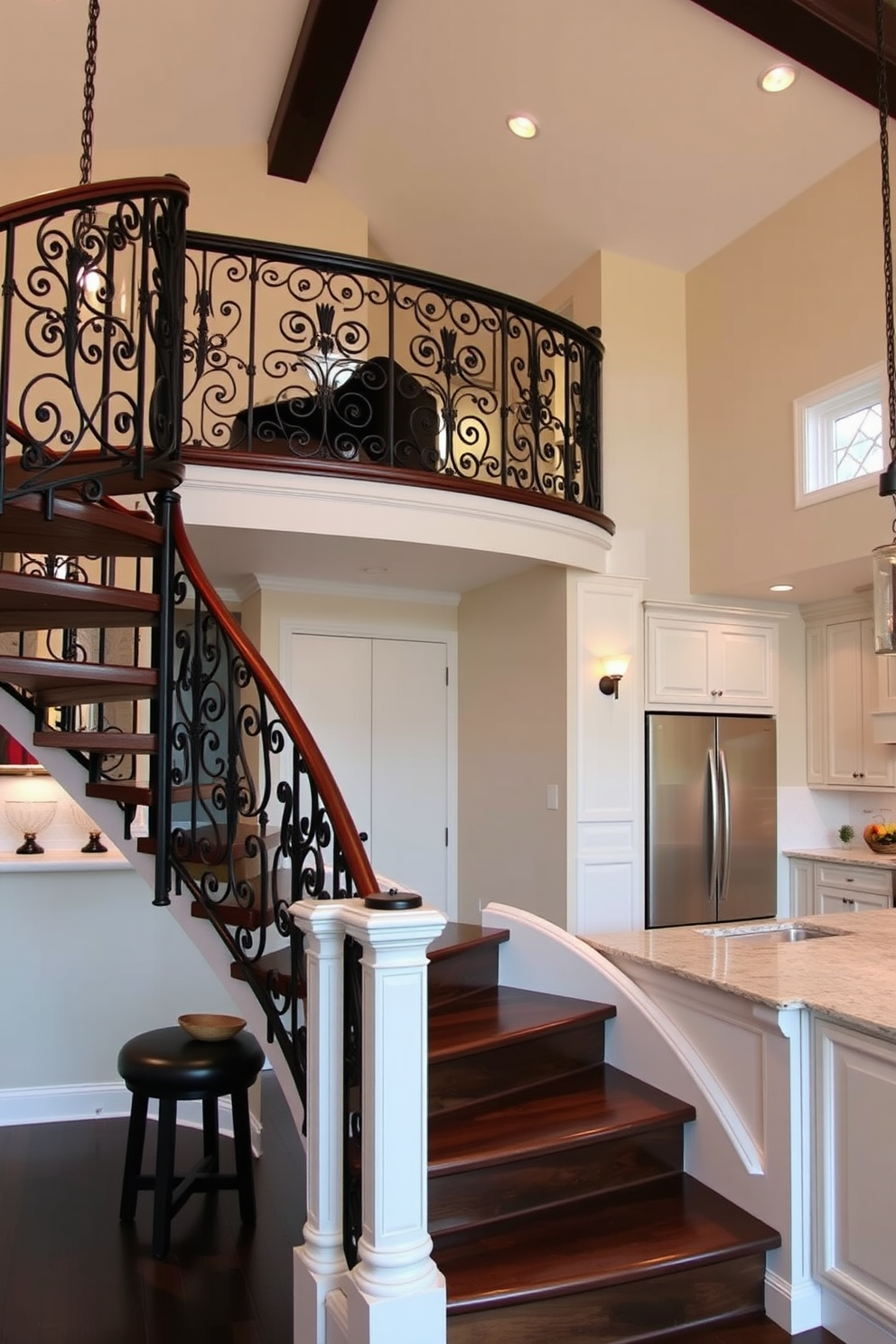 A stunning kitchen features a grand staircase adorned with a wrought iron railing showcasing intricate designs. The staircase leads to a cozy loft area, enhancing the open concept while complementing the modern kitchen aesthetics.