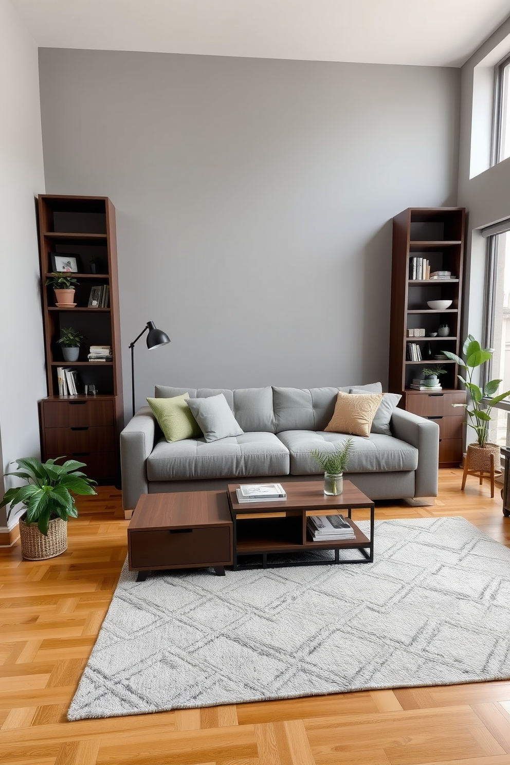 A stylish studio living room featuring a multifunctional sofa that converts into a bed, surrounded by sleek shelving units that double as room dividers. The walls are painted a soft gray, and the flooring is a warm hardwood, creating an inviting atmosphere for relaxation and entertainment. A compact coffee table with built-in storage is positioned in front of the sofa, complemented by a cozy area rug that adds texture. Large windows allow natural light to flood the space, highlighting the carefully curated decor and indoor plants that bring life to the room.