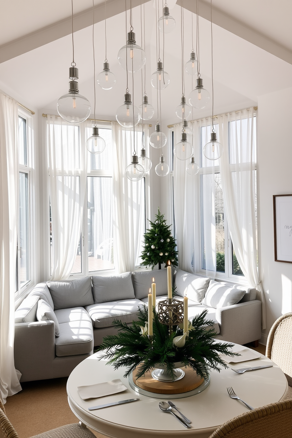 A bright and airy sunroom filled with natural light. The space features large windows adorned with sheer white curtains, allowing the sunlight to filter through softly. In the center, a cozy seating area is arranged with a plush sectional sofa in light gray. Glass ornaments in various shapes and sizes are tastefully hung from the ceiling, adding a modern touch to the festive decor. A beautifully set table showcases a festive centerpiece with greenery and candles. The walls are decorated with subtle Hanukkah-themed art, enhancing the holiday spirit in a contemporary style.