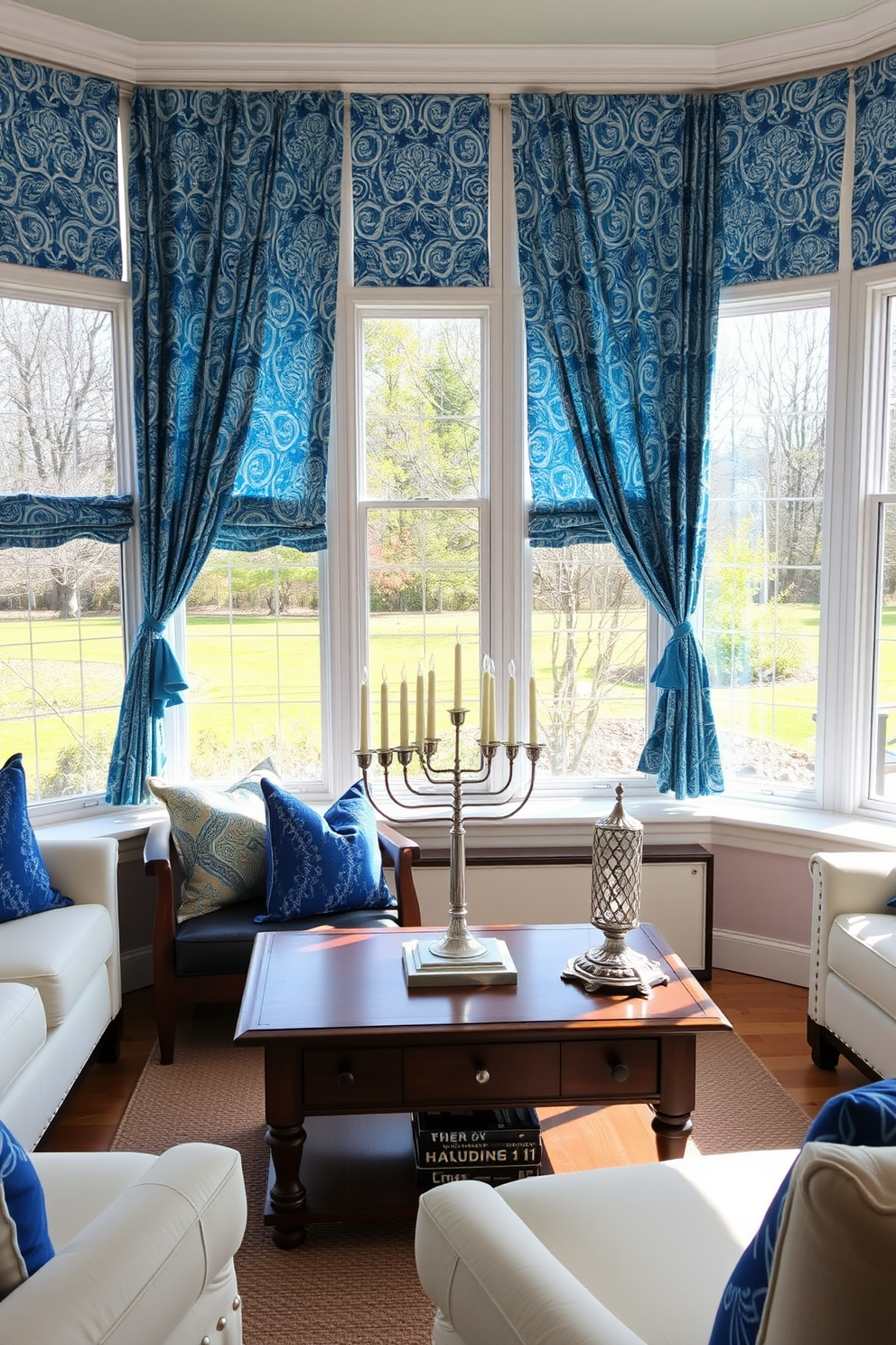 A sunroom filled with natural light features large windows adorned with vibrant patterned curtains that bring a cheerful and inviting atmosphere. The space is decorated for Hanukkah with blue and silver accents, including a beautiful menorah placed on a wooden coffee table surrounded by comfortable seating.