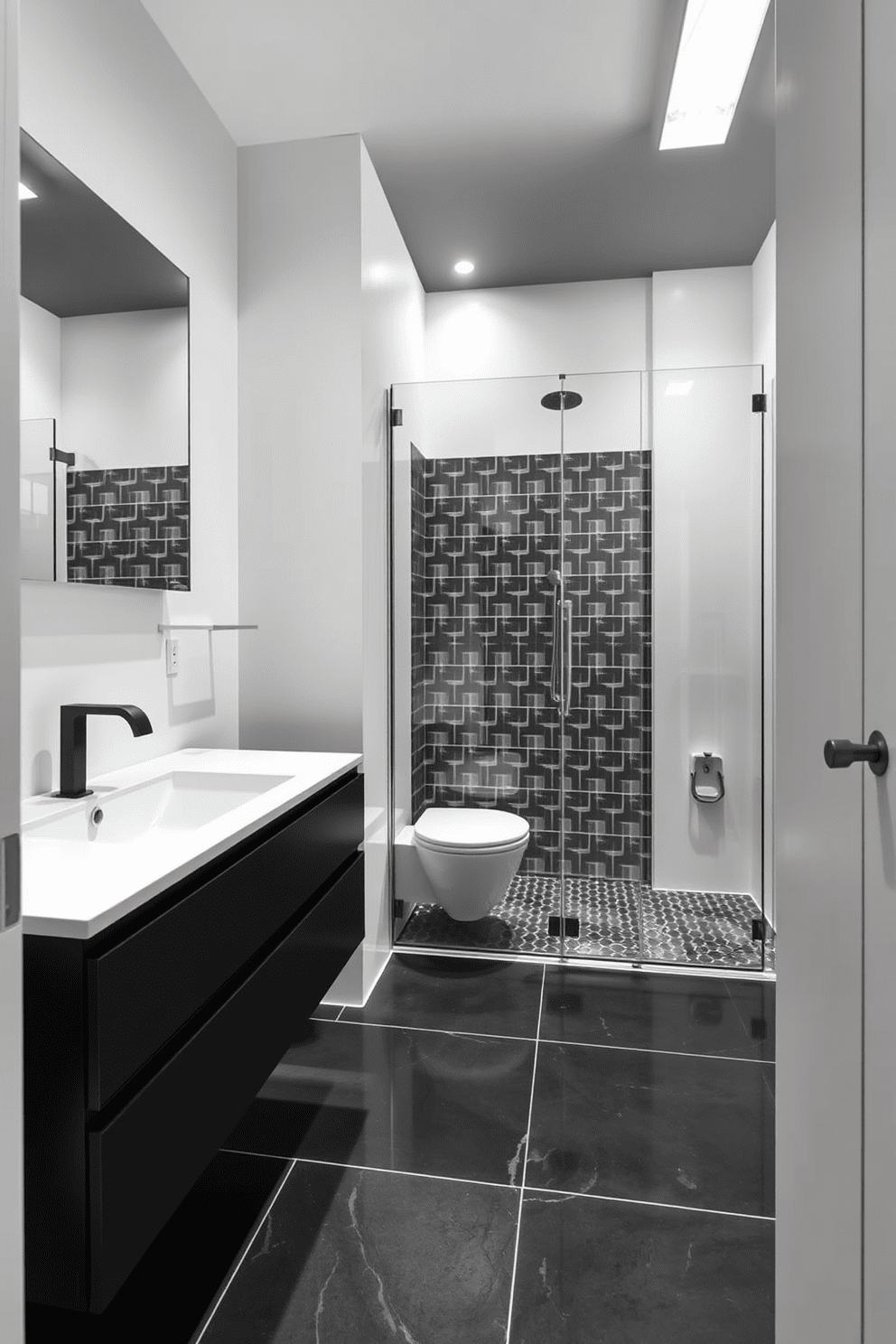 Sleek black and white color scheme defines this modern three-quarter bathroom. The walls are painted in crisp white, while the floor features large black tiles that create a striking contrast. A floating black vanity with a white countertop houses a stylish sink and sleek faucet. Above the vanity, a frameless mirror reflects the minimalist design, enhancing the sense of space. The shower area is enclosed with glass panels, showcasing a black and white geometric tile pattern. Soft lighting fixtures are strategically placed to create a warm and inviting atmosphere.