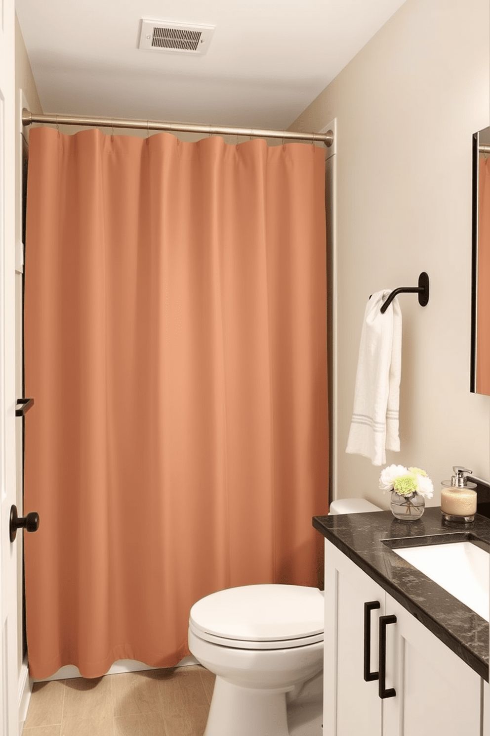 A vibrant shower curtain in a bold color creates a striking focal point in the three-quarter bathroom. The walls are painted in a soft neutral tone to balance the vividness of the curtain, enhancing the overall aesthetic. Incorporate sleek fixtures with modern lines to complement the bold shower curtain. A stylish vanity with a minimalist design and ample storage space adds functionality while maintaining the bathroom's chic appeal.