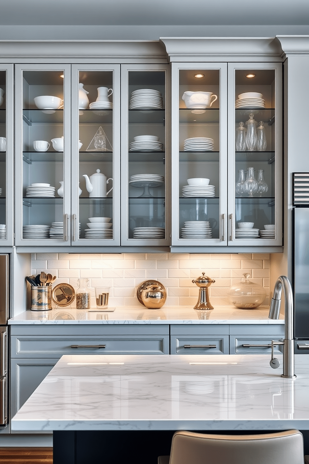 A modern townhouse kitchen featuring glass-front cabinets elegantly displaying an array of fine dishware. The cabinets are complemented by sleek stainless steel appliances and a large island with bar seating for casual dining.