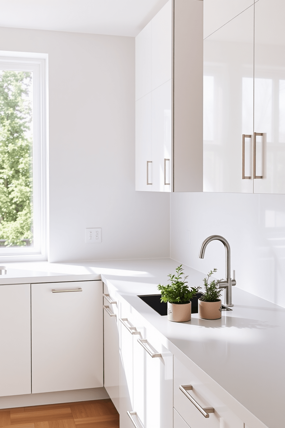 A minimalist kitchen design featuring cabinetry with sleek finishes and clean lines. The cabinetry is in a soft white hue, complemented by brushed stainless steel handles and a seamless countertop that extends into a breakfast bar. Natural light floods the space through large windows, highlighting the simplicity of the design. A few potted herbs sit on the countertop, adding a touch of greenery and warmth to the modern aesthetic.