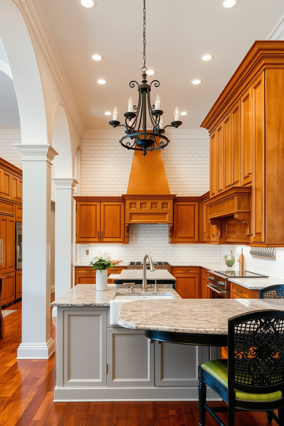 A traditional kitchen design featuring elegant arches and sturdy columns. The space is filled with warm wood cabinetry, a large farmhouse sink, and a central island topped with a polished granite surface. The walls are adorned with classic white subway tiles, and the flooring consists of rich hardwood. A vintage chandelier hangs above the dining area, adding a touch of charm to the inviting atmosphere.