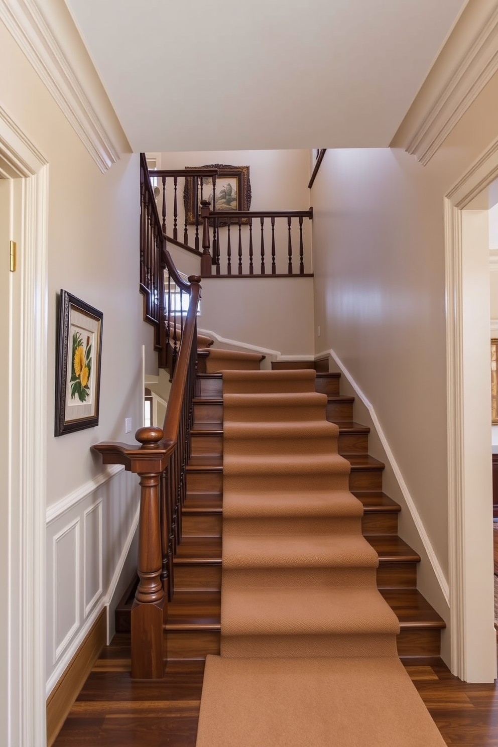 A traditional staircase design featuring elegant crown molding along the edges. The staircase is adorned with rich wooden banisters and a plush runner that adds warmth and texture.