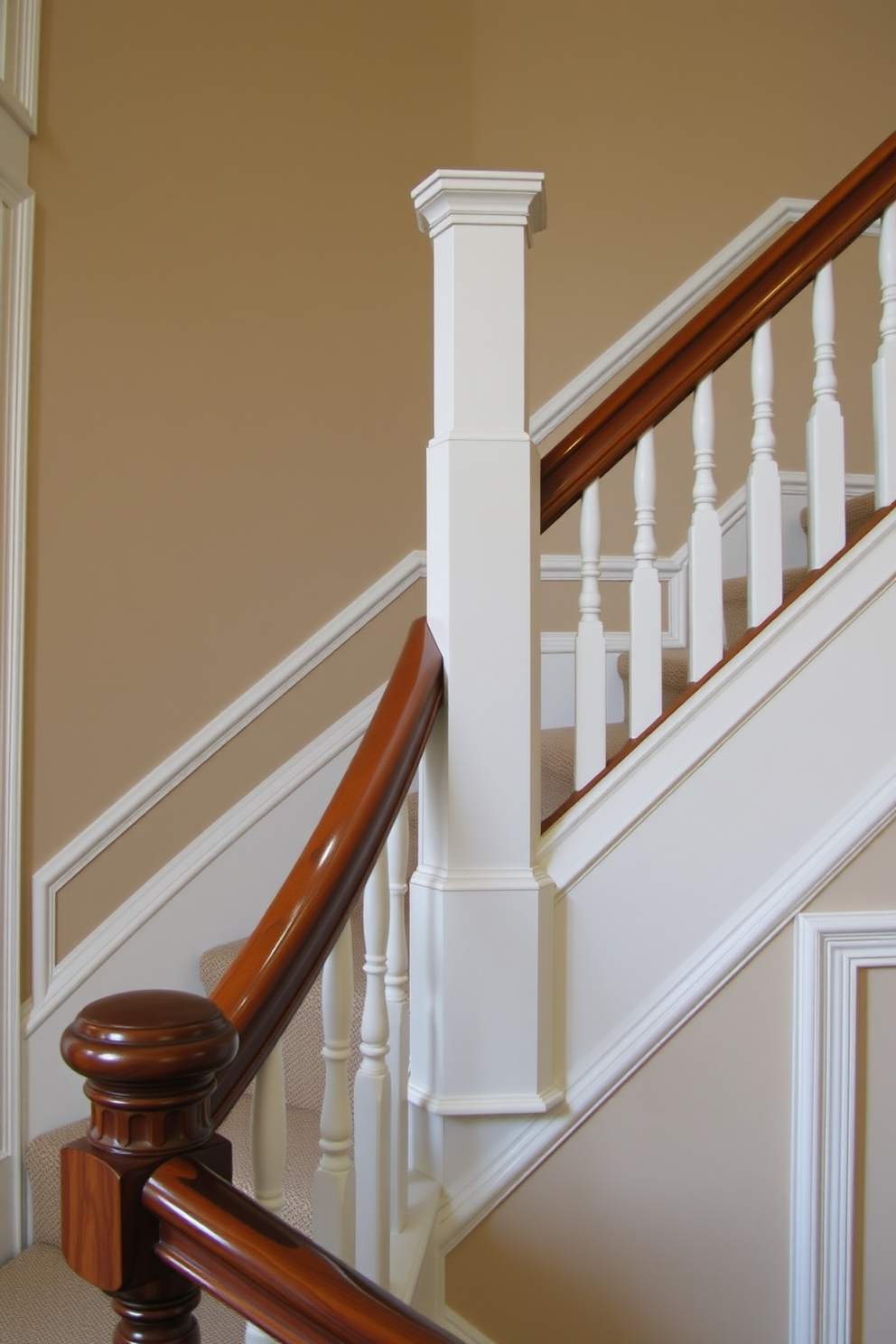 A traditional staircase features detailed trim work around the edges, showcasing intricate molding that adds elegance to the design. The balustrade is crafted from rich wood, with a polished handrail that complements the overall aesthetic of the home.