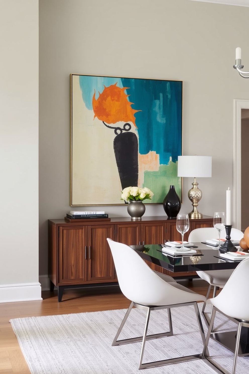 A transitional dining room featuring a stylish sideboard against a neutral wall. Above the sideboard, a statement artwork piece adds a vibrant touch, complemented by elegant table settings and modern dining chairs.