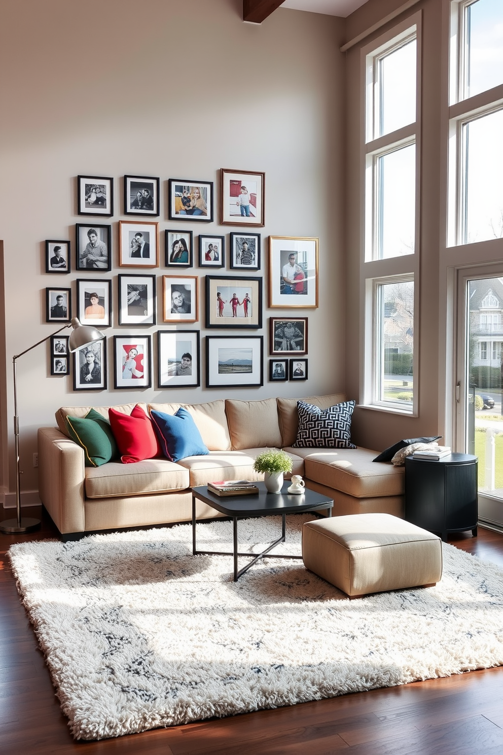 A cozy transitional living room featuring a gallery wall adorned with framed photos in various sizes. The space includes a plush sectional sofa in a neutral tone, complemented by colorful throw pillows and a stylish coffee table at the center. Natural light floods the room through large windows, highlighting a soft area rug that ties the seating area together. A contemporary floor lamp stands beside the sofa, adding warmth and inviting ambiance to the space.