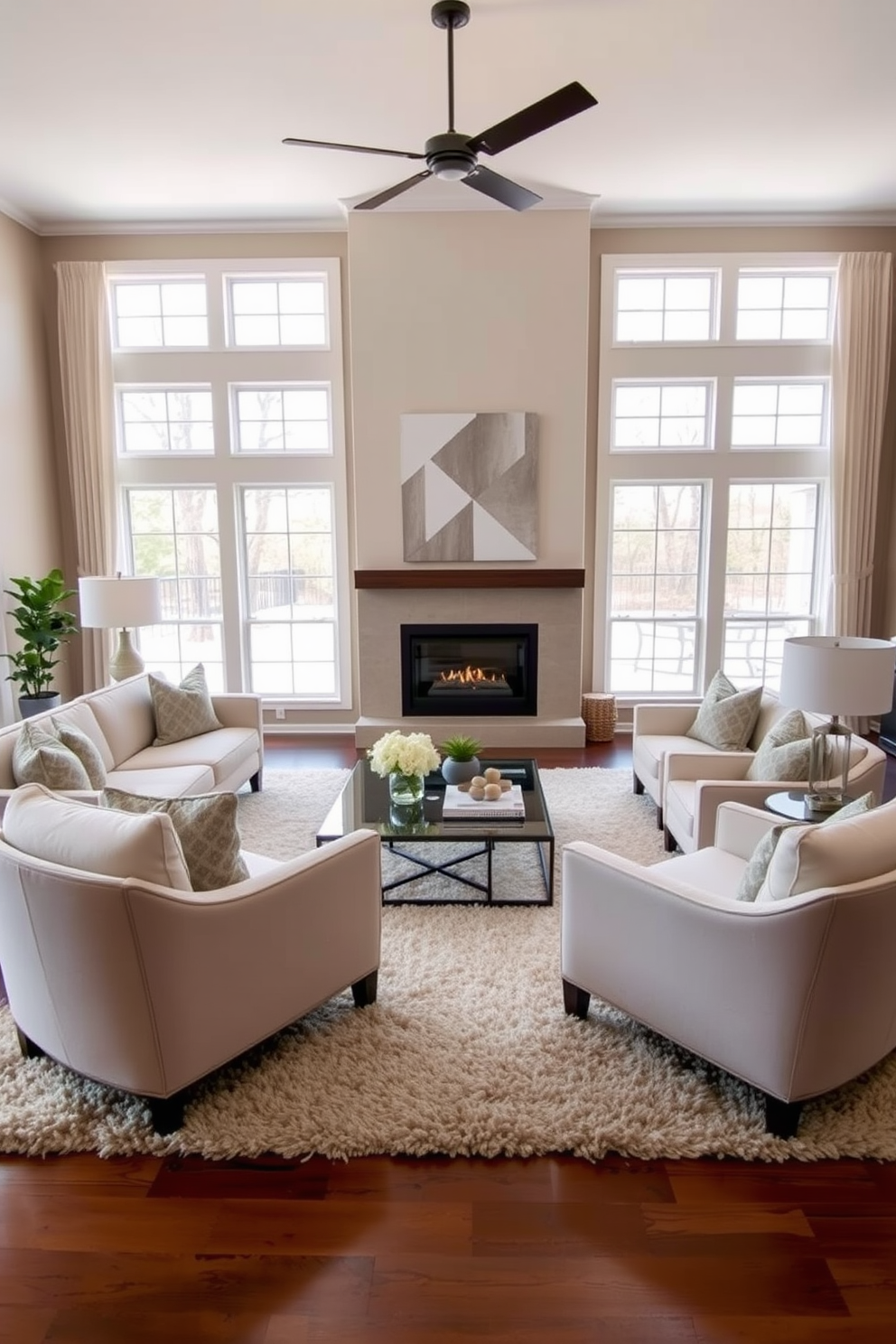 A transitional living room that seamlessly blends modern and traditional elements. The space features a plush area rug that defines the seating area, with a comfortable sectional sofa and stylish armchairs arranged around a sleek coffee table. Soft neutral tones dominate the color palette, complemented by accent pillows in rich textures. Large windows allow natural light to flood the room, enhancing the warm ambiance created by a contemporary fireplace.