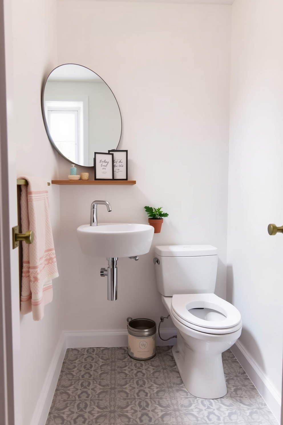 A compact powder room featuring a wall-mounted sink with a sleek chrome faucet. The walls are painted in a light pastel color, and a large round mirror reflects the natural light coming from a small window. The space includes a floating shelf adorned with decorative items and a small potted plant. A stylish, compact toilet is positioned next to the sink, and patterned tiles cover the floor to add visual interest.