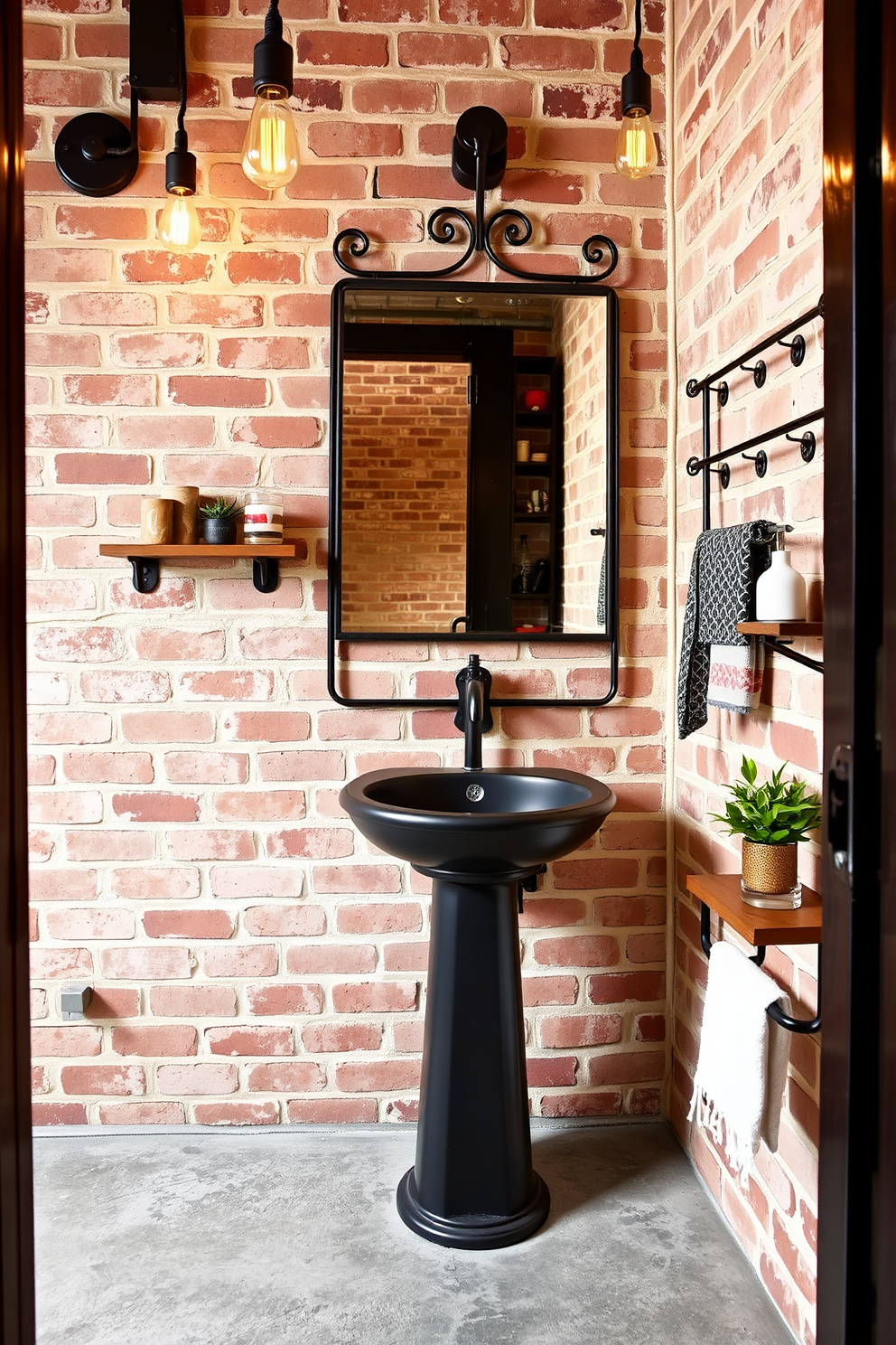 A trendy powder room featuring industrial elements with exposed brick walls and a concrete floor. A sleek black pedestal sink is paired with a vintage-style mirror framed in wrought iron, creating a striking focal point. Metal accents are incorporated through light fixtures with an Edison bulb design and a stylish towel rack. To add warmth, a small wooden shelf holds decorative items and a potted plant, enhancing the edgy atmosphere.