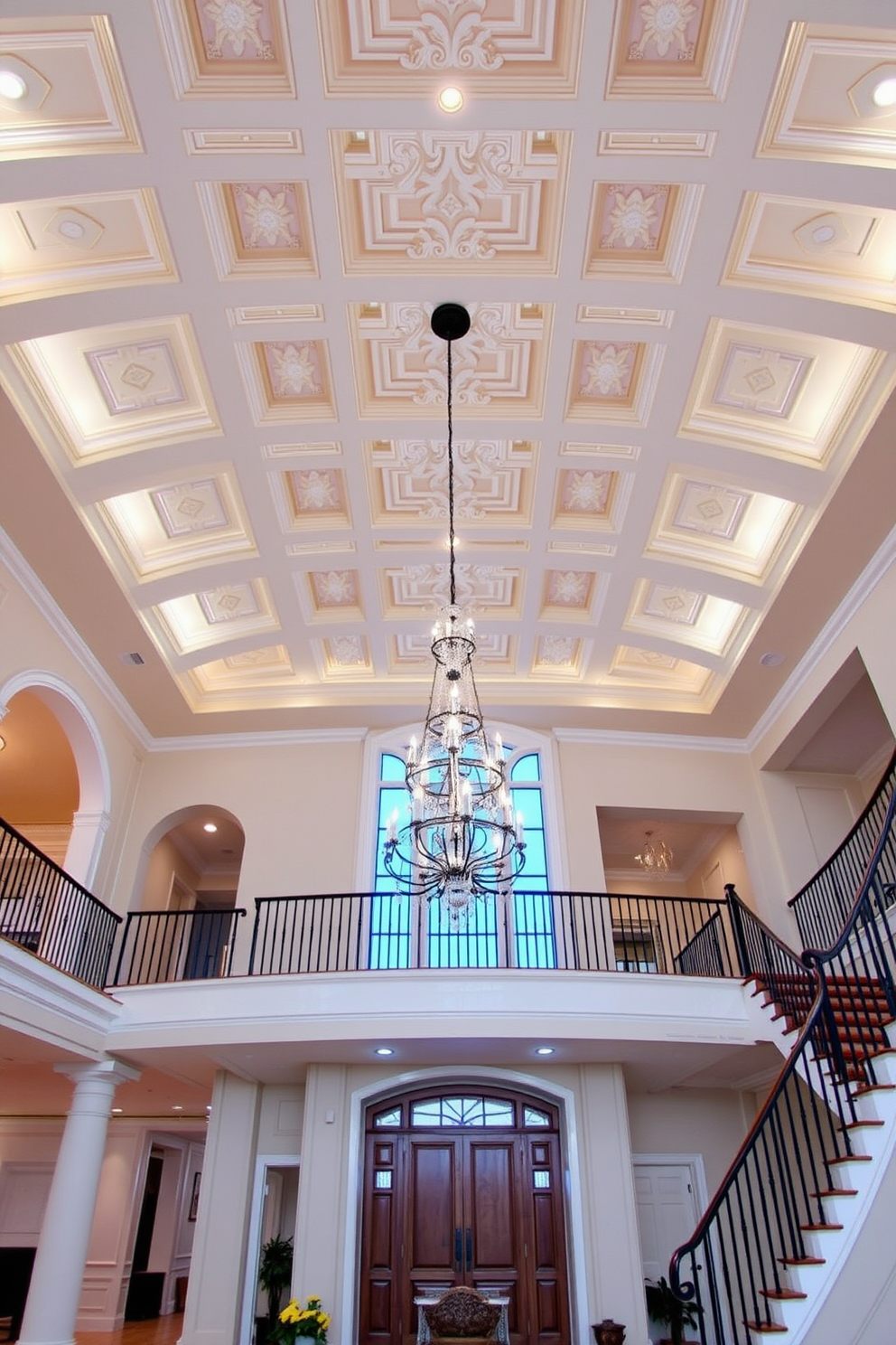 Artistic ceiling design for wow factor. The ceiling features an intricate coffered pattern with soft ambient lighting that highlights the architectural details. Two story foyer design ideas. The space is grand and airy with a sweeping staircase, adorned with elegant railings and a stunning chandelier that draws the eye upward.