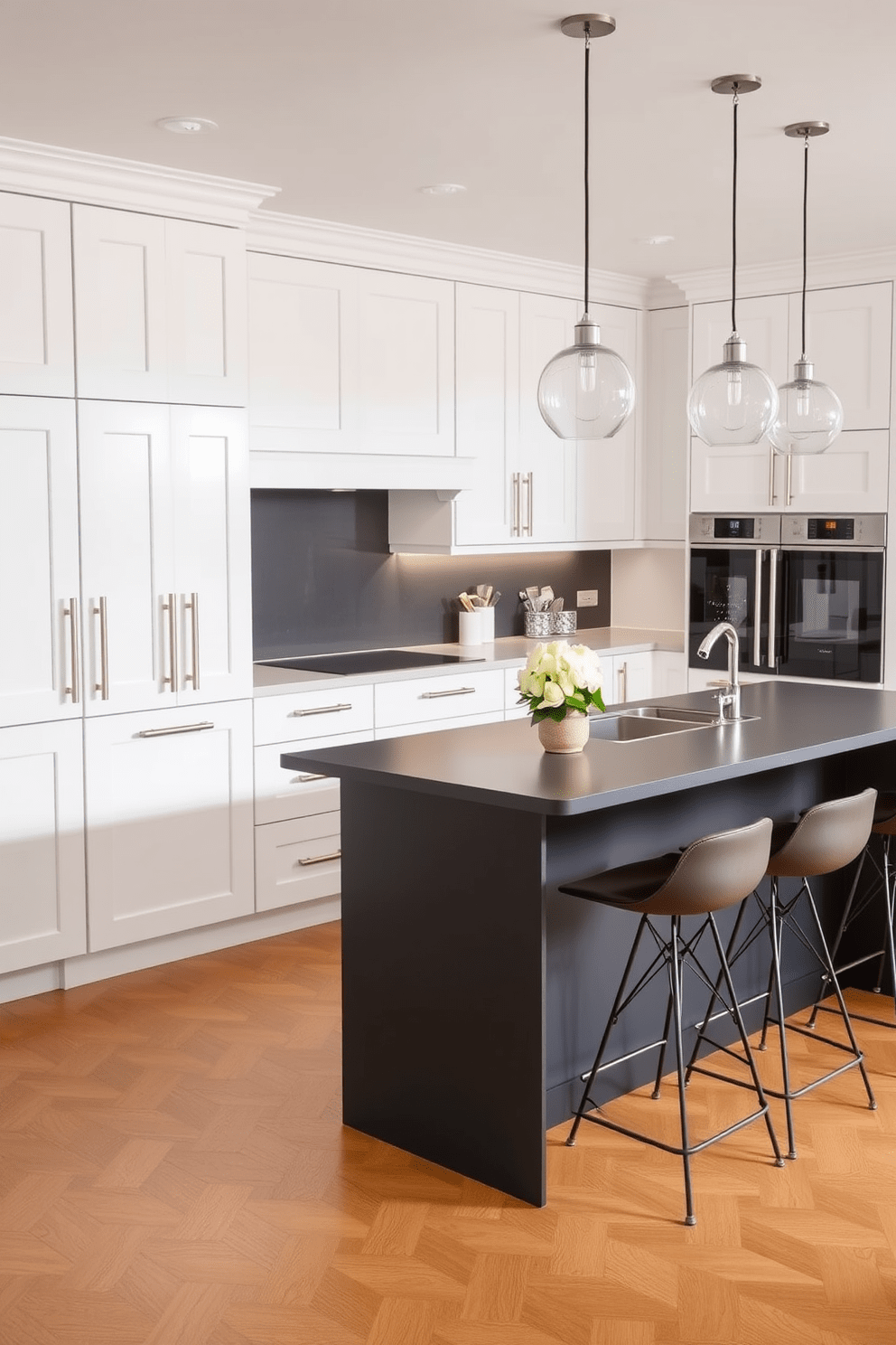 A modern kitchen featuring a crisp white cabinetry with sleek handles, complemented by a striking charcoal island at the center. The island is adorned with stylish bar stools, and pendant lights hang above, creating a warm and inviting atmosphere.