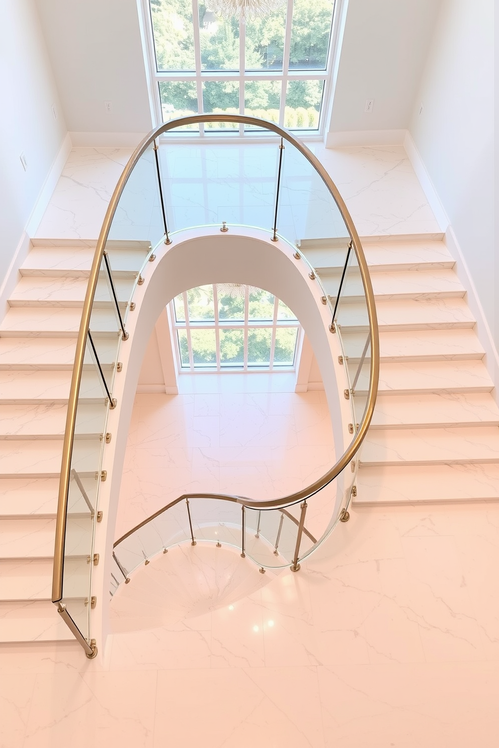 A luxurious U-shaped staircase features stunning white marble steps that elegantly curve around a central landing. The staircase is accented with sleek glass railings and brushed gold hardware, creating a modern yet timeless appeal.