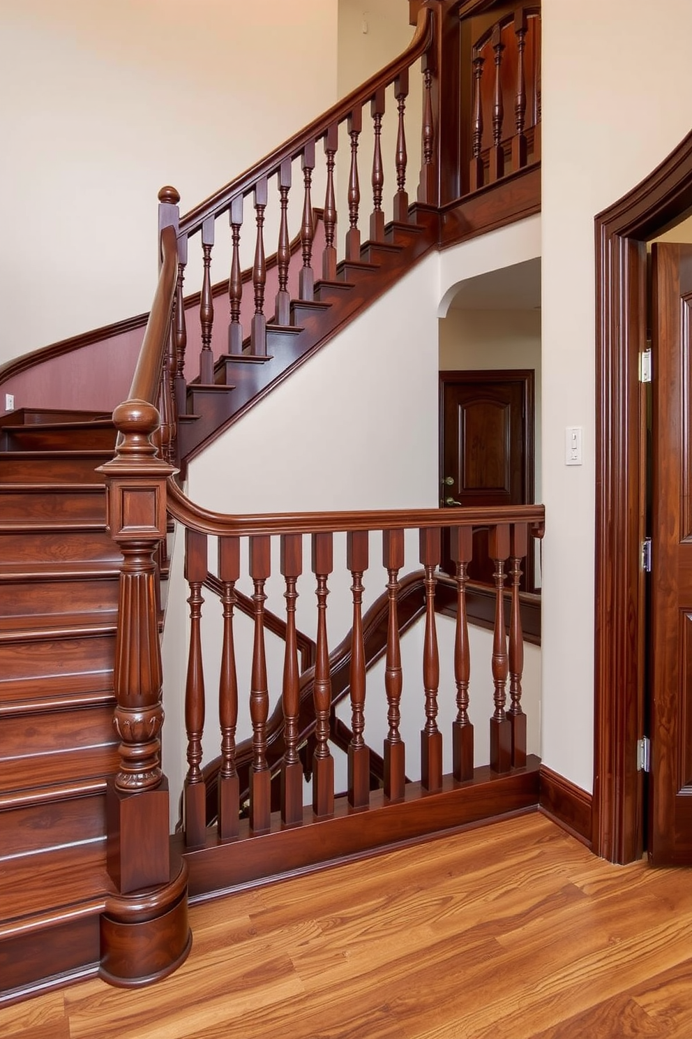 A classic wooden staircase with rich finishes showcases elegant craftsmanship and timeless appeal. The U-shaped design features intricately carved balusters and a polished handrail, creating a stunning focal point in the entryway.