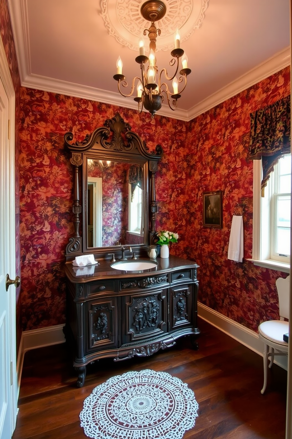 Antique vanity with intricate carvings and a large ornate mirror dominates the space. The walls are adorned with rich wallpaper featuring floral patterns, and the floor is covered in dark hardwood. A vintage chandelier hangs from the ceiling, casting a warm glow over the room. Elegant accessories such as a porcelain soap dish and a lace doily add a touch of charm to the Victorian powder room.