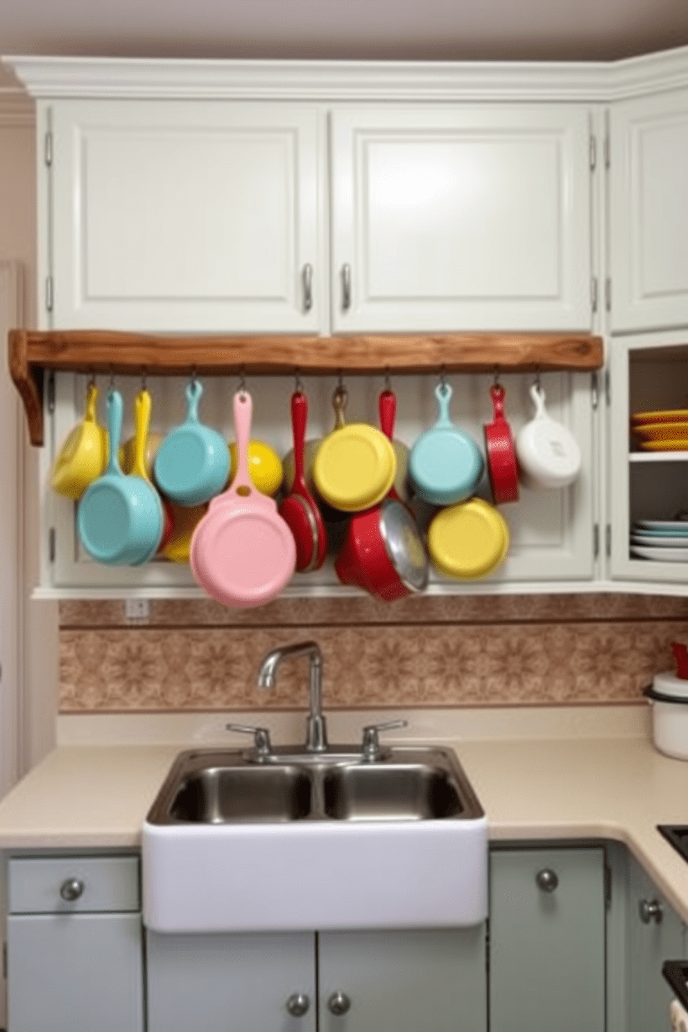 A charming vintage kitchen showcases a collection of colorful enamelware pots and pans hanging from a rustic wooden rack. The cabinets are painted in a soft pastel hue, complemented by a farmhouse sink and a patterned tile backsplash.