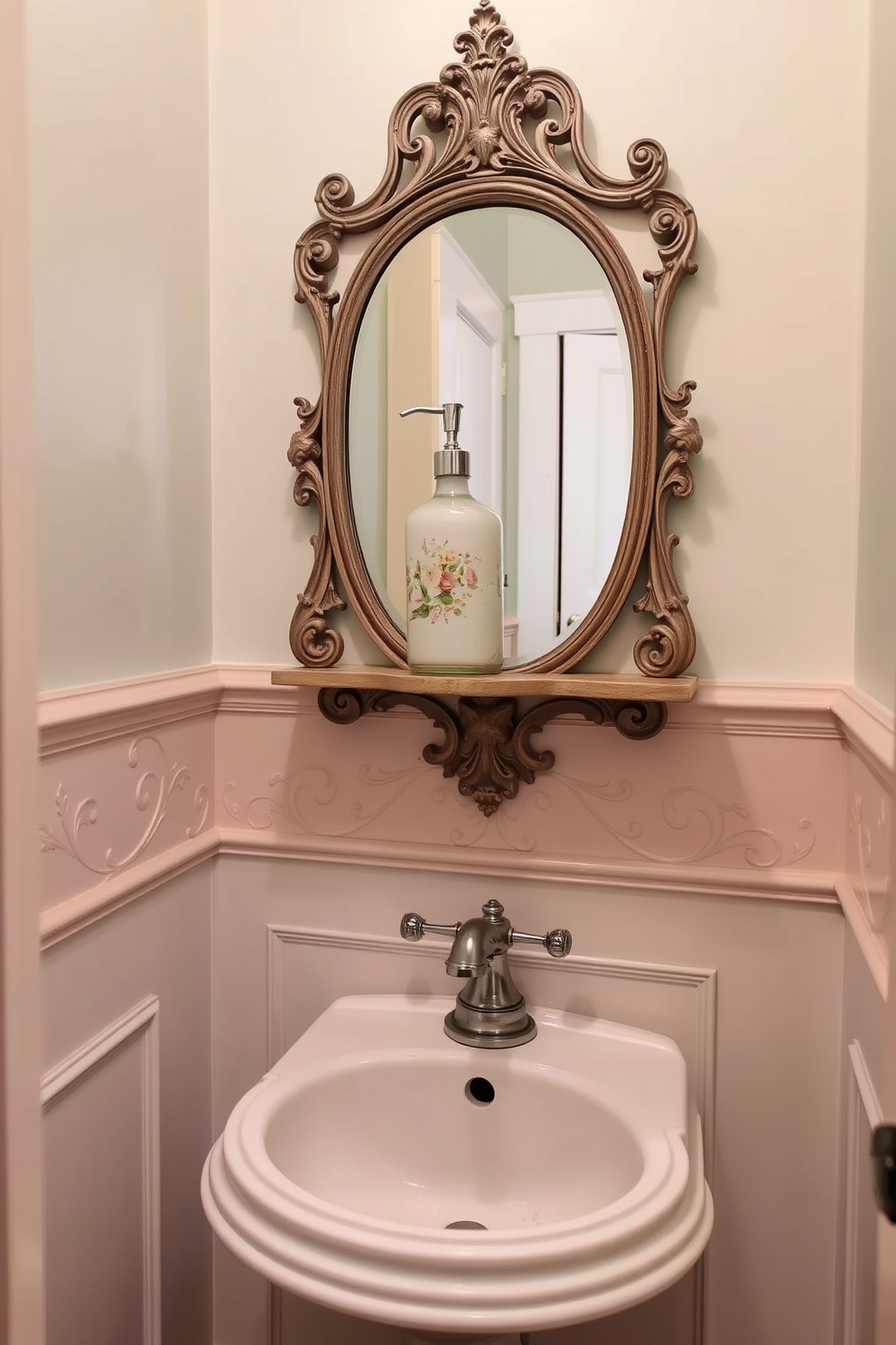 A vintage powder room featuring an old-fashioned soap dispenser adorned with a delicate floral design. The walls are painted in a soft pastel hue, complemented by ornate wainscoting and a small antique mirror above a classic pedestal sink.