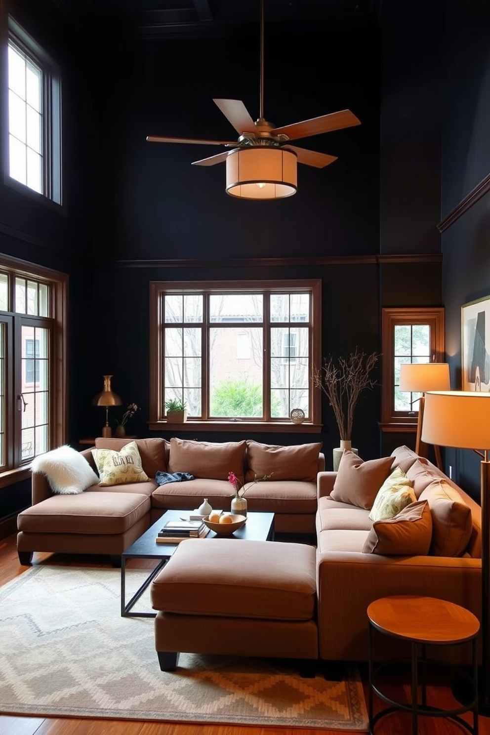 A cozy living room with dark navy walls that create an intimate atmosphere. The furniture includes a plush sectional sofa in a lighter shade, complemented by warm wooden accents and soft lighting fixtures. Large windows allow natural light to filter in, enhancing the rich color of the walls. A geometric area rug in neutral tones adds texture and warmth to the space.