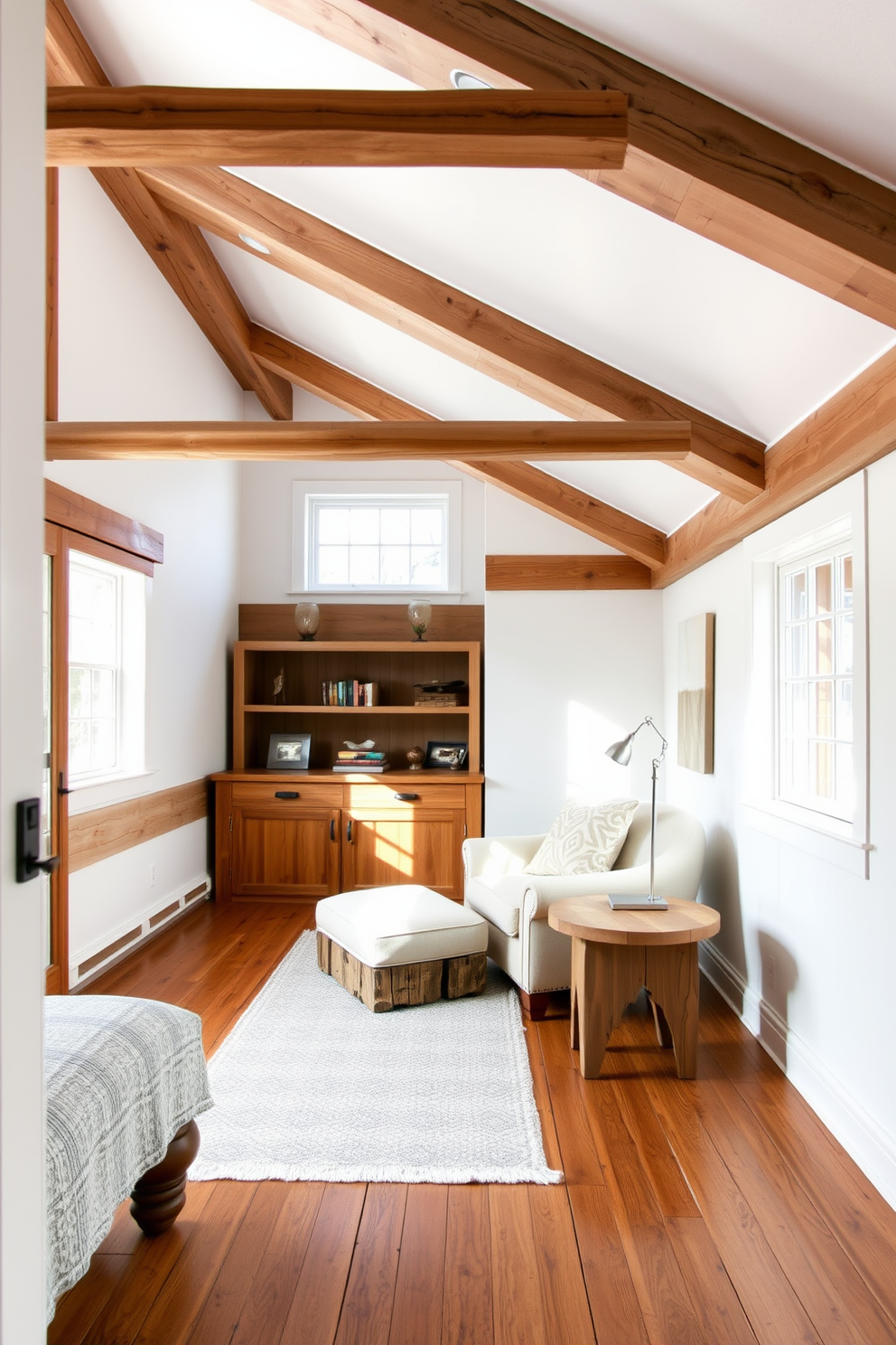 A rustic white attic features reclaimed wood accents throughout the space. The walls are painted a soft white, creating a bright and airy atmosphere that highlights the natural wood tones. In one corner, a cozy reading nook is set up with a plush armchair and a small side table made of reclaimed wood. Large windows allow natural light to flood the room, enhancing the warmth of the wooden beams and flooring.