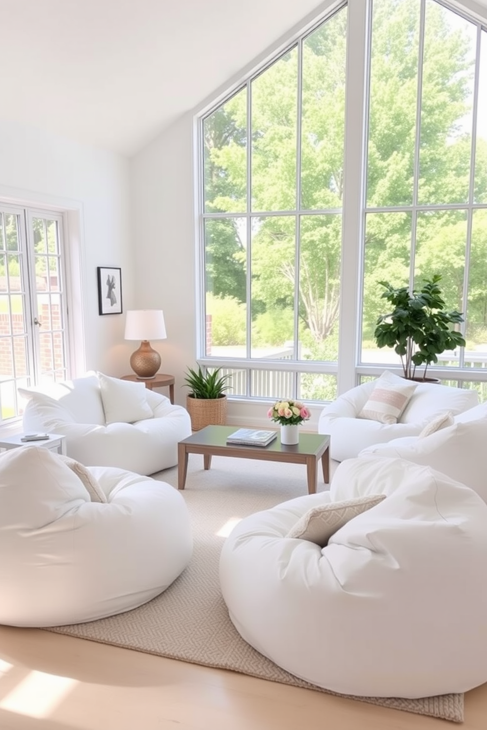 A cozy white family room features comfortable white bean bags arranged for casual seating. The space is bright and airy, with large windows allowing natural light to flood in, complemented by soft, neutral-colored walls.