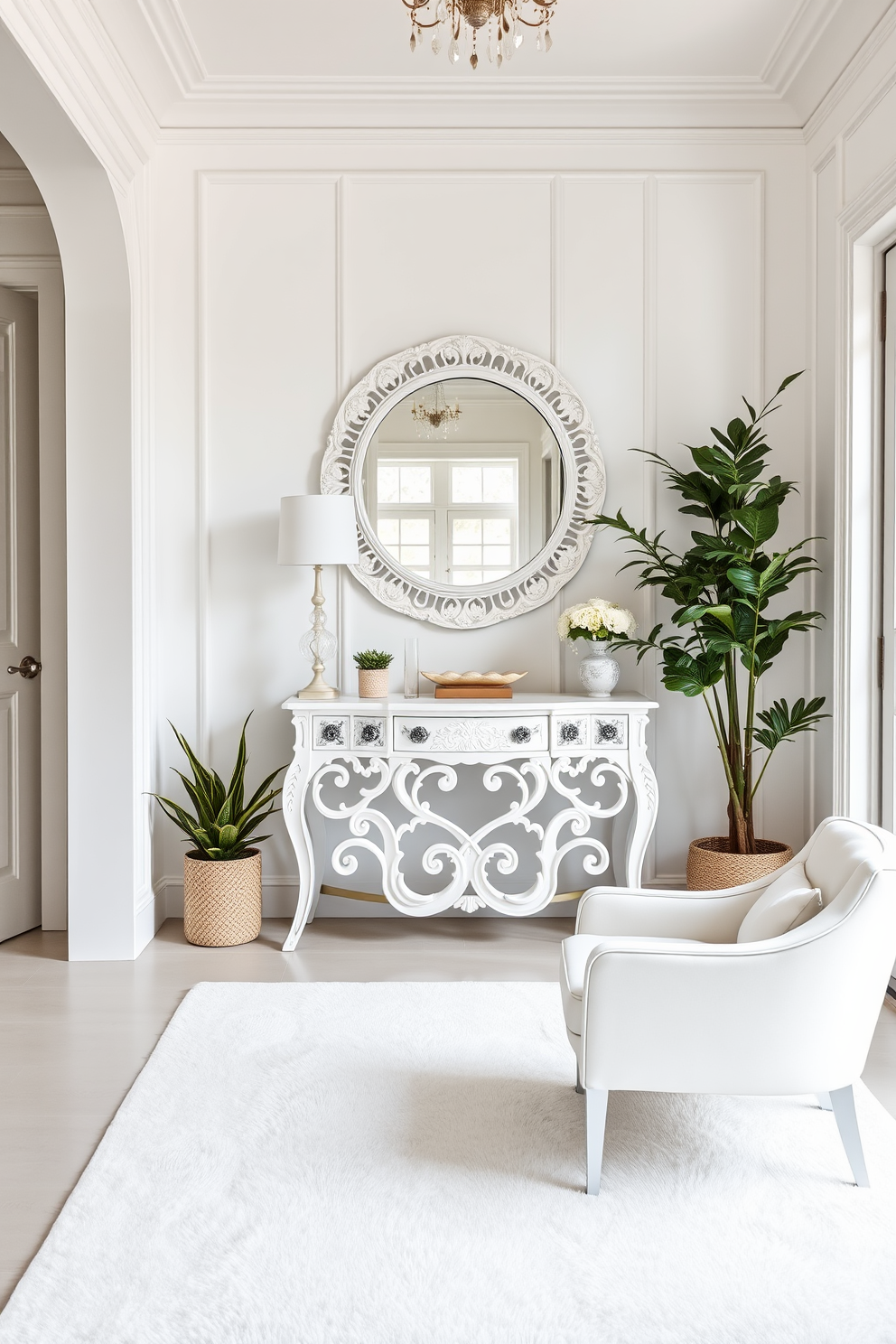 Layered white textures create a serene and elegant foyer. The space features a white console table with intricate detailing, paired with a large round mirror that reflects natural light. The walls are adorned with white paneling, and the floor is covered with a soft white area rug. Potted greenery adds a touch of freshness, while stylish white accent chairs invite guests to sit and enjoy the ambiance.