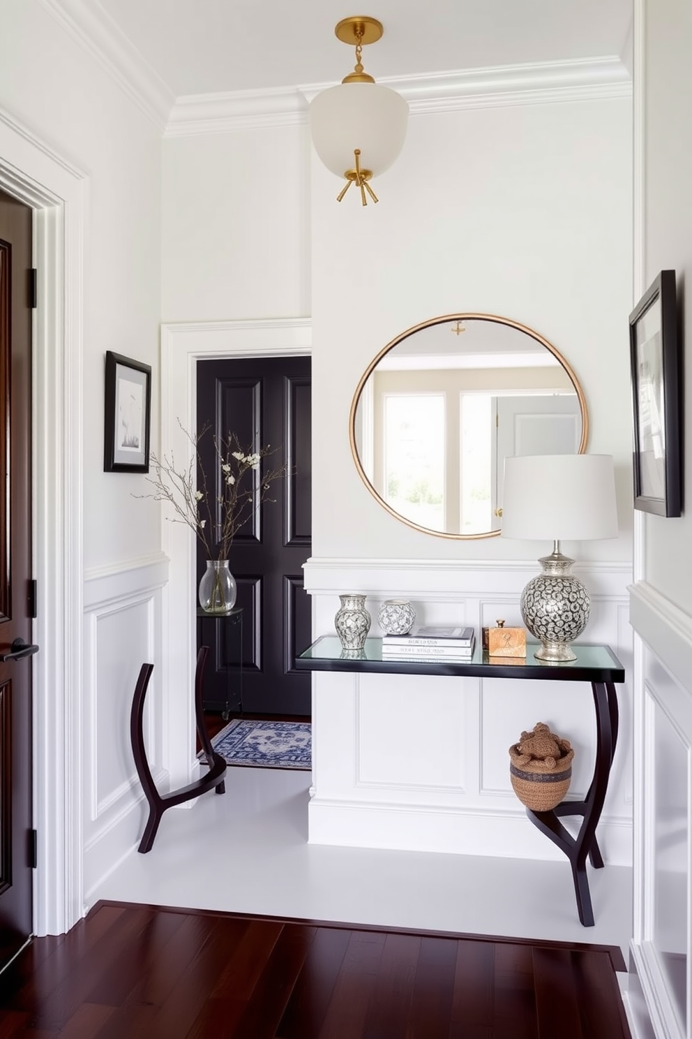 A bright foyer featuring elegant white wainscoting that contrasts beautifully with dark wood accents. The space is adorned with a stylish console table, complemented by a large round mirror and decorative accessories.