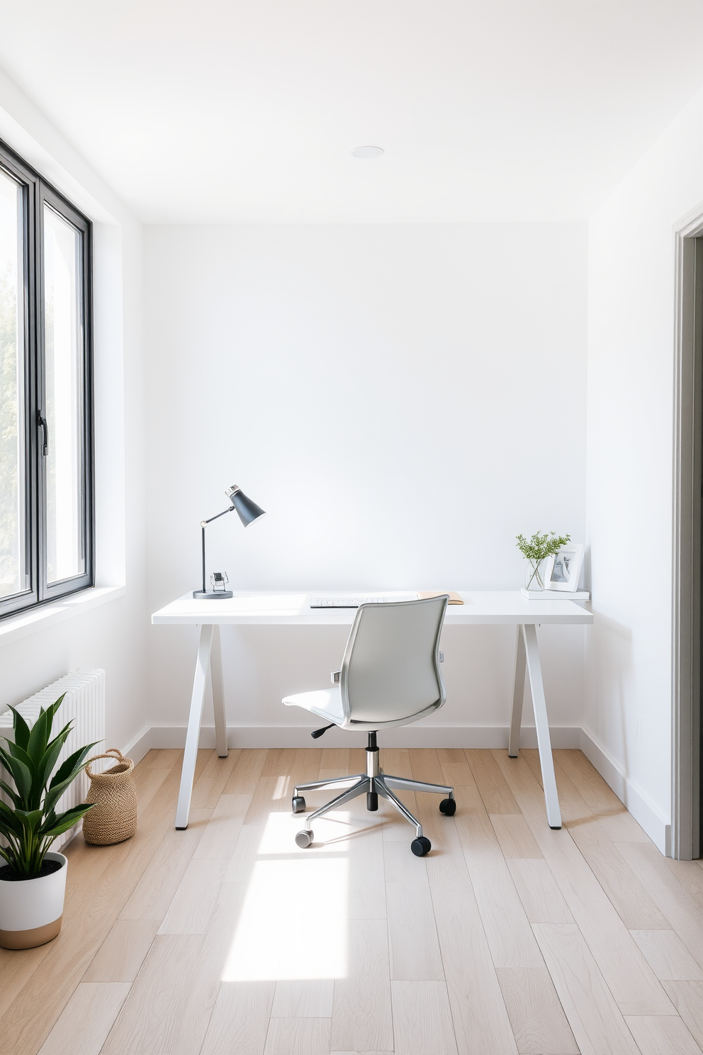 A minimalist desk with sleek lines occupies the center of a bright home office. The walls are painted in a soft white, and a large window allows natural light to flood the space. A comfortable ergonomic chair complements the desk, while a few carefully chosen decorative items add a touch of personality. The floor features light wood planks, enhancing the airy and open feel of the room.