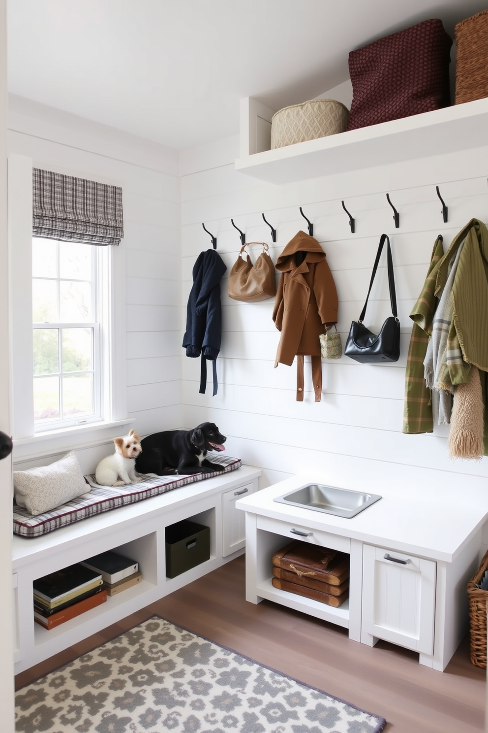 Integrated pet area for furry friends. A cozy space with built-in dog beds and feeding stations, featuring durable materials that withstand wear and tear. The area includes storage for leashes and toys, with a stylish design that complements the overall decor of the home. White mudroom design ideas. A bright and airy space with white shiplap walls and a bench with storage underneath. Hooks for coats and bags line the wall, and a patterned rug adds a touch of warmth to the room.