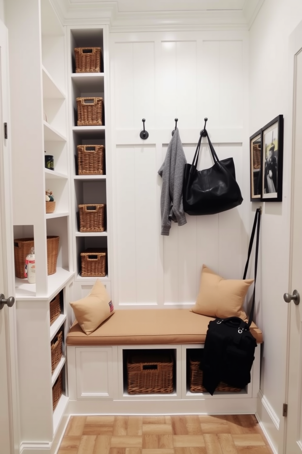 A stylish mudroom featuring smart use of vertical space with multiple shelves. The walls are painted in a soft white tone, and the shelves are lined with neatly organized baskets for storage. A built-in bench with plush cushions provides a comfortable seating area. Hooks are mounted above for hanging coats and bags, creating a functional yet inviting entryway.