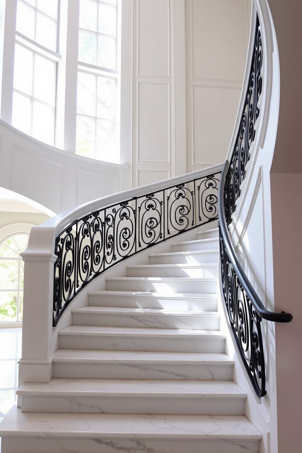 A luxurious white staircase with elegant marble accents curves gracefully upwards. The balustrade features intricate wrought iron details, complementing the polished marble steps that reflect natural light beautifully.