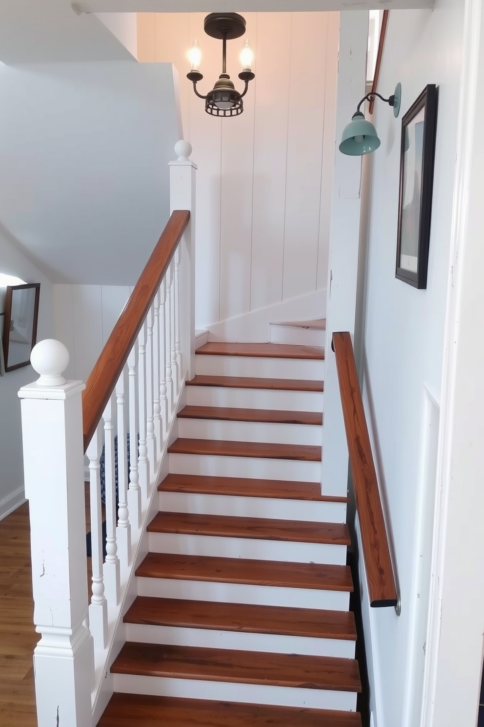 A charming farmhouse style white painted staircase with rustic wooden handrails. The staircase features wide, inviting steps and is adorned with vintage-style lighting fixtures that enhance its warm ambiance.