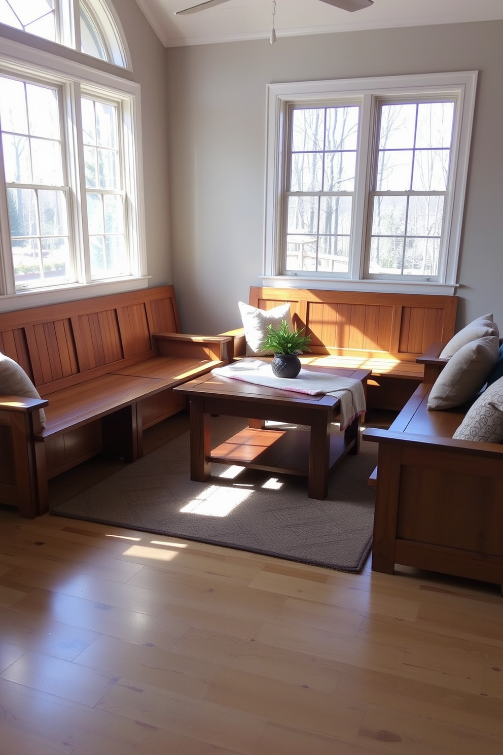 A cozy living room featuring wooden benches for extra seating. The benches are arranged around a central coffee table, adorned with a soft throw and decorative pillows. Natural light floods the space through large windows, highlighting the warm tones of the wooden furniture. The walls are painted in a soft beige, complementing the rich wood tones of the benches and flooring.